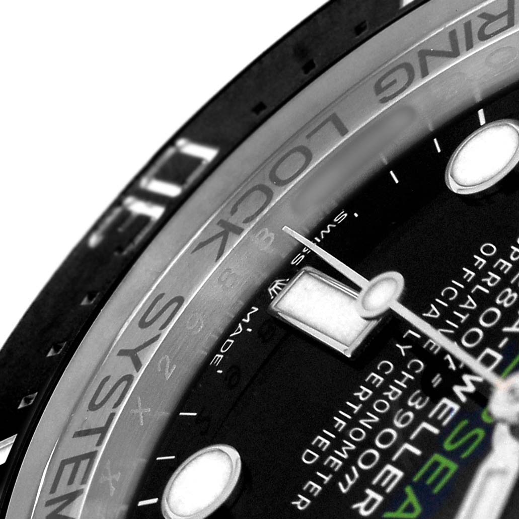 The image shows a close-up view of the Rolex Sea-Dweller 126660 Men's Stainless Steel Blue Dial's dial and bezel, highlighting the watch face details and text.