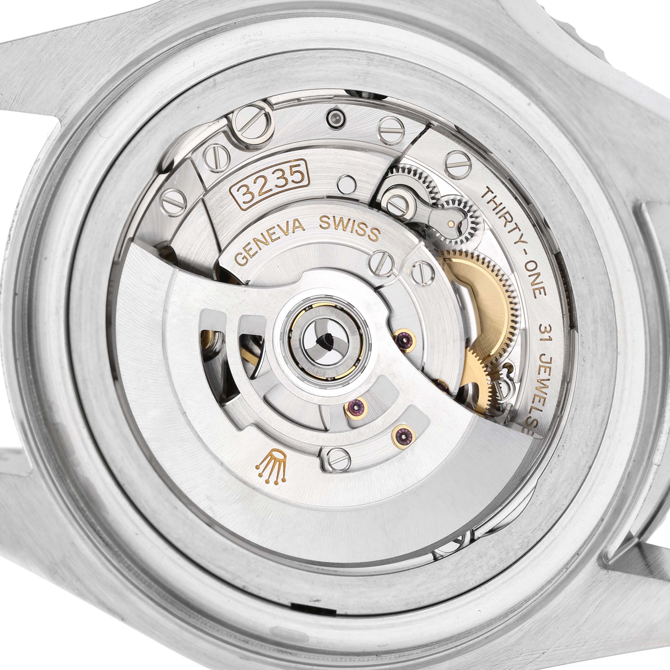 The image shows the movement of a Rolex Sea-Dweller 126660 Men's Stainless Steel Blue Dial, highlighting the rotor and internal mechanics from the back.