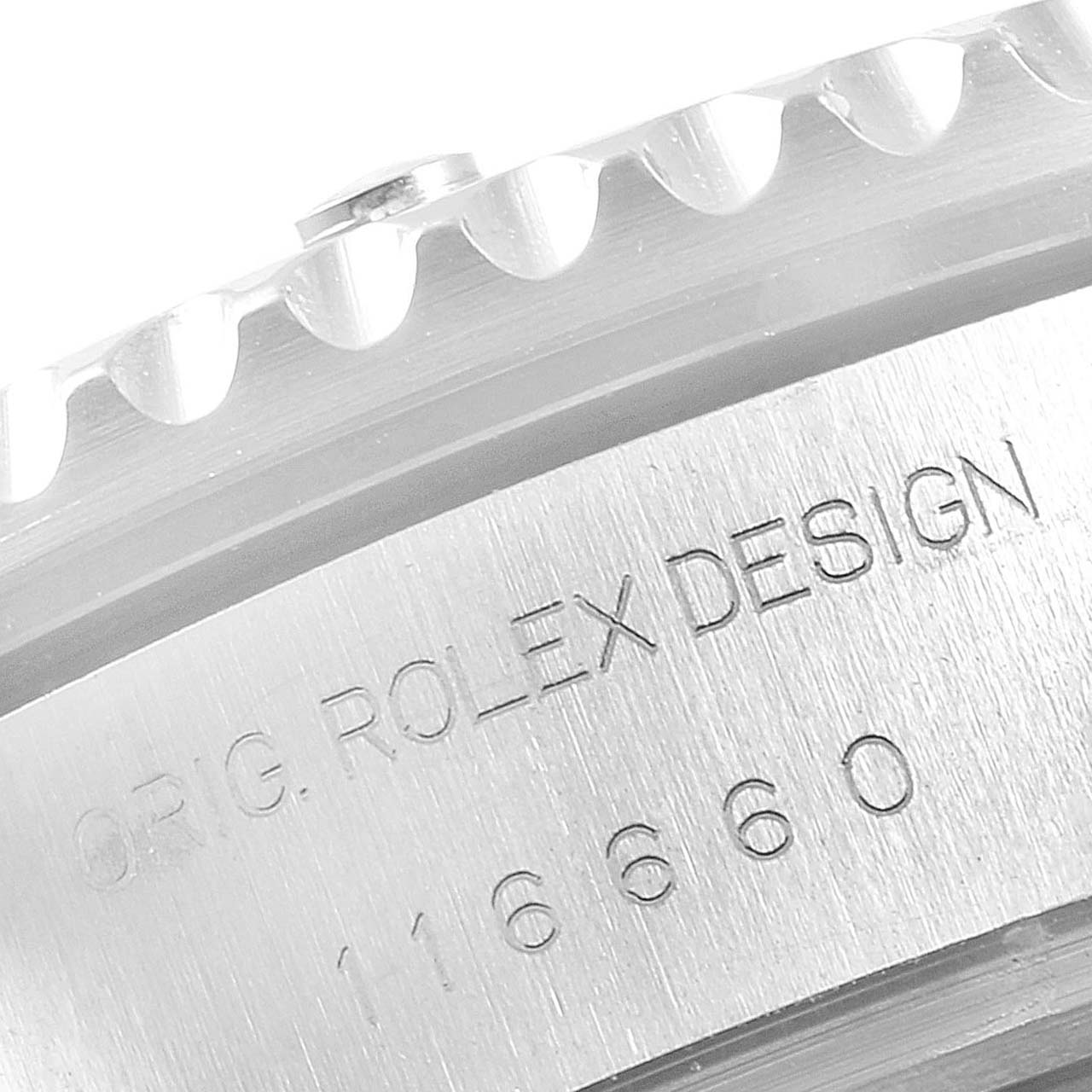 This image shows a close-up side view of the engraved serial number and bezel of the Rolex Sea-Dweller 116660 Men's Stainless Steel Blue Dial 116660 Men's Stainless Steel Blue Dial watch.