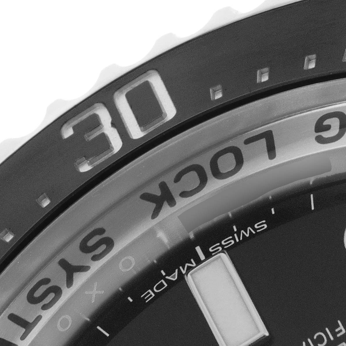 The image shows a close-up of the bezel and dial of the Rolex Sea-Dweller 116660 Men's Stainless Steel Blue Dial 116660 Men's Stainless Steel Blue Dial watch.