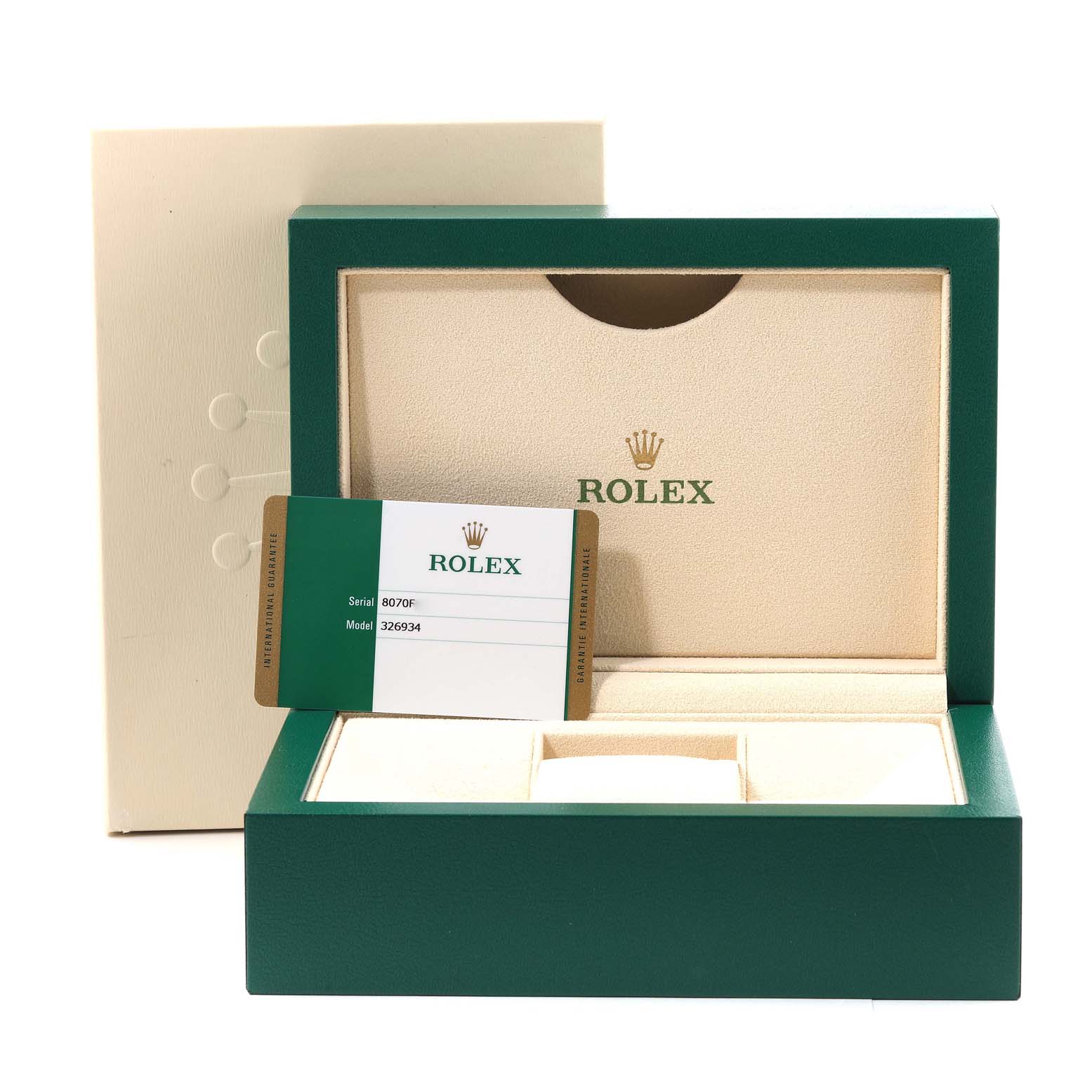 The image shows an open green Rolex box for the Sky-Dweller model with a warranty card displayed inside.
