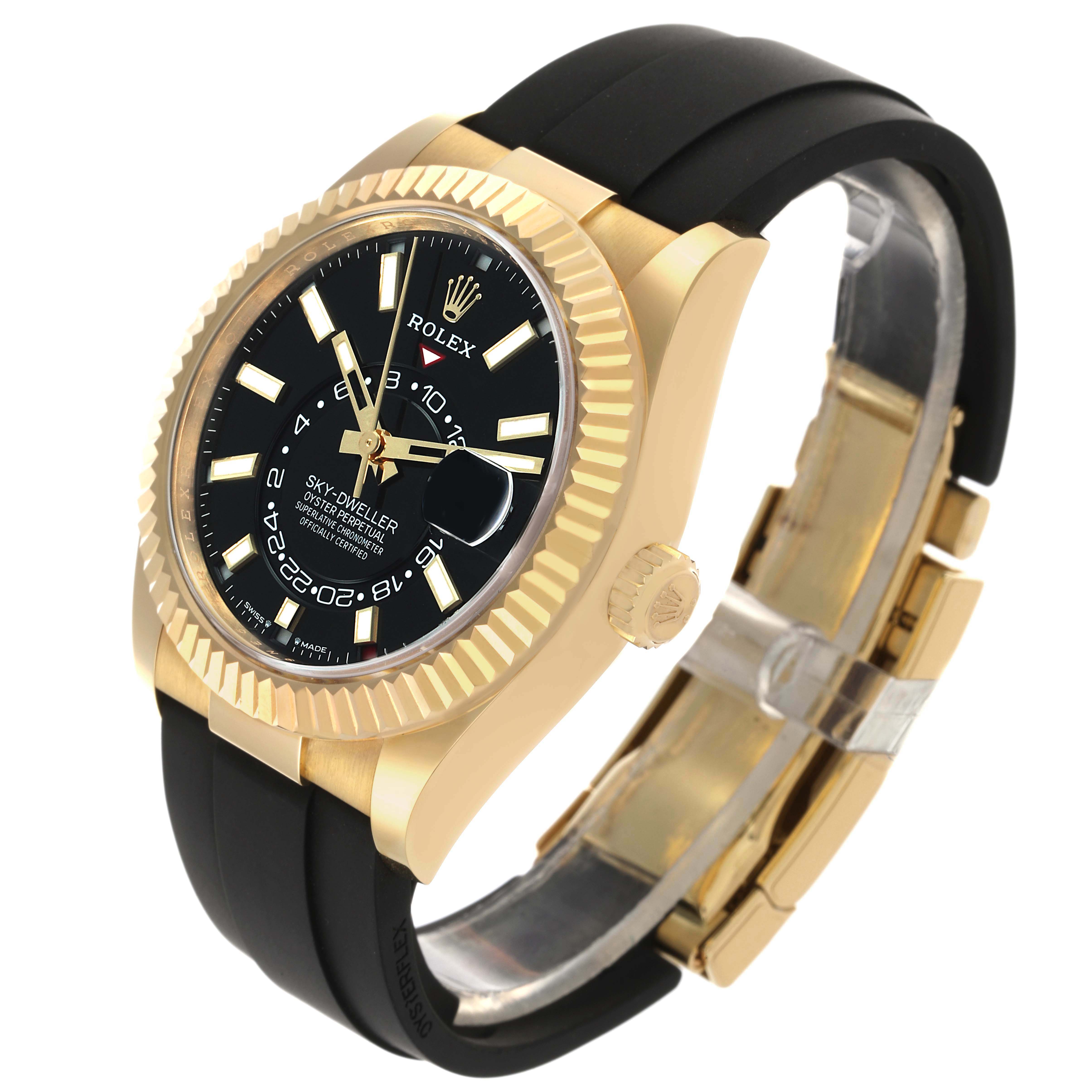The Rolex Sky-Dweller 336238 Men's Yellow Gold Black Dial watch is shown at an angle highlighting its gold case, black dial, fluted bezel, and black strap.