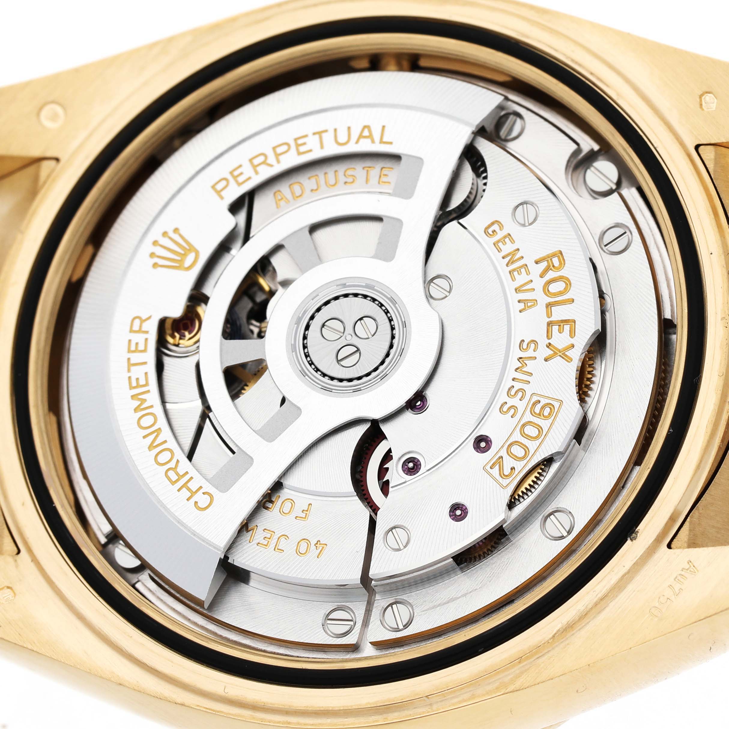 The image shows a detailed view of the Rolex Sky-Dweller 336238 Men's Yellow Gold Black Dial's movement, highlighting the rotor and inner mechanisms.