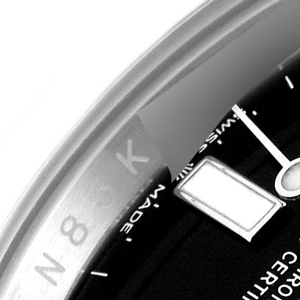 The image shows a close-up view of the dial and bezel of a Rolex Submariner 126610 Men
s Stainless Steel Black Dial 126610 Men
s Stainless Steel Black Dial, focusing on the minute hand and part of the date window.