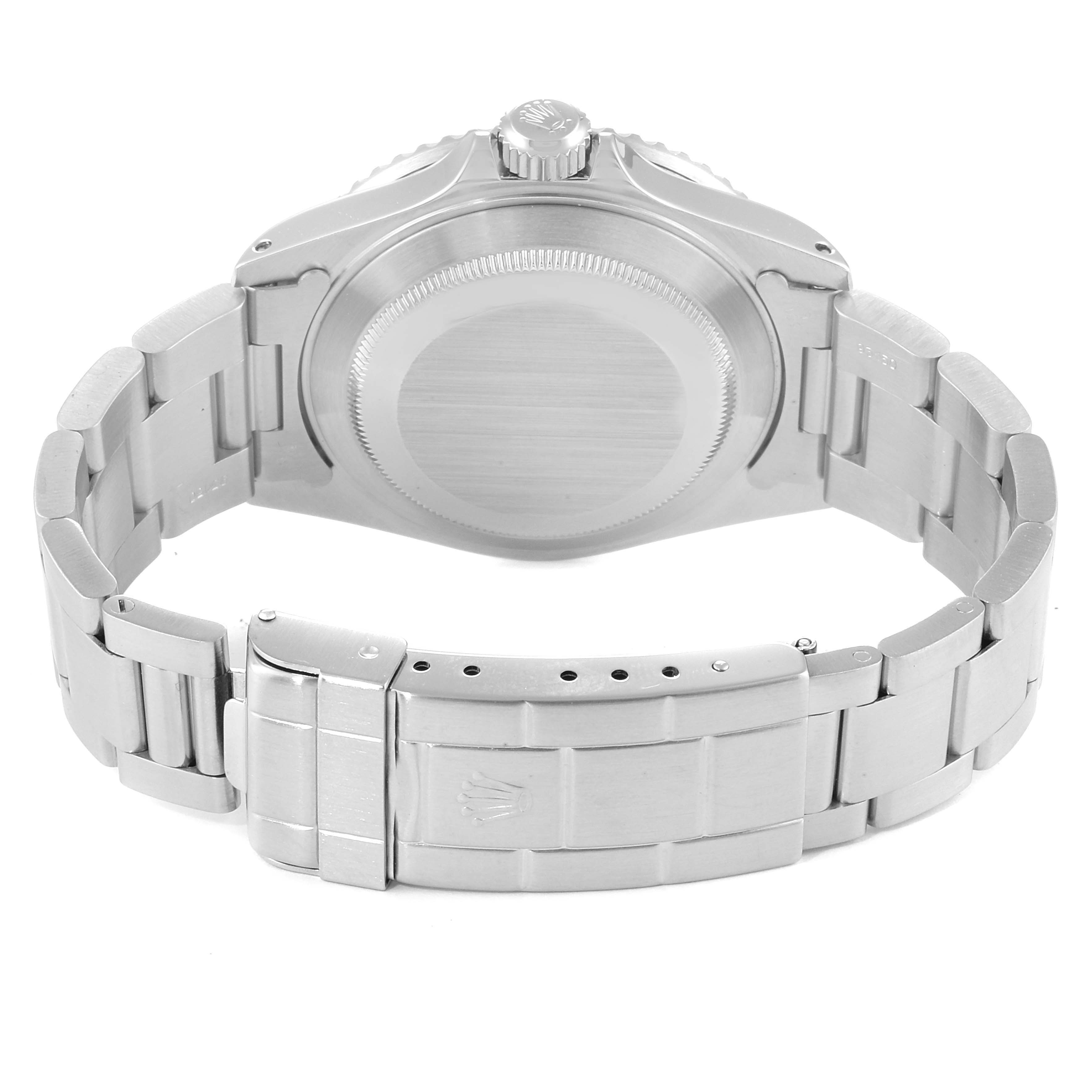 The image shows the back case and bracelet clasp of a Rolex Submariner 16610 Men
s Stainless Steel Black Dial 16610 Men
s Stainless Steel Black Dial watch.