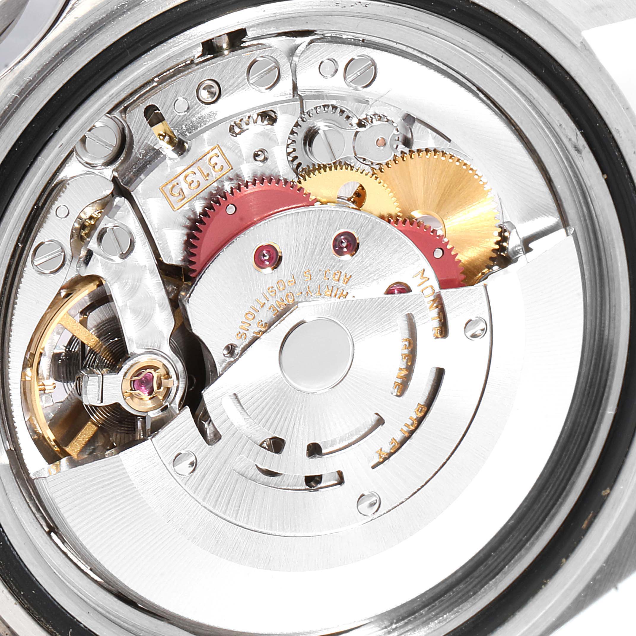 The image shows an up-close view of the inner mechanism of the Rolex Submariner 16610 Men
s Stainless Steel Black Dial 16610 Men
s Stainless Steel Black Dial watch.