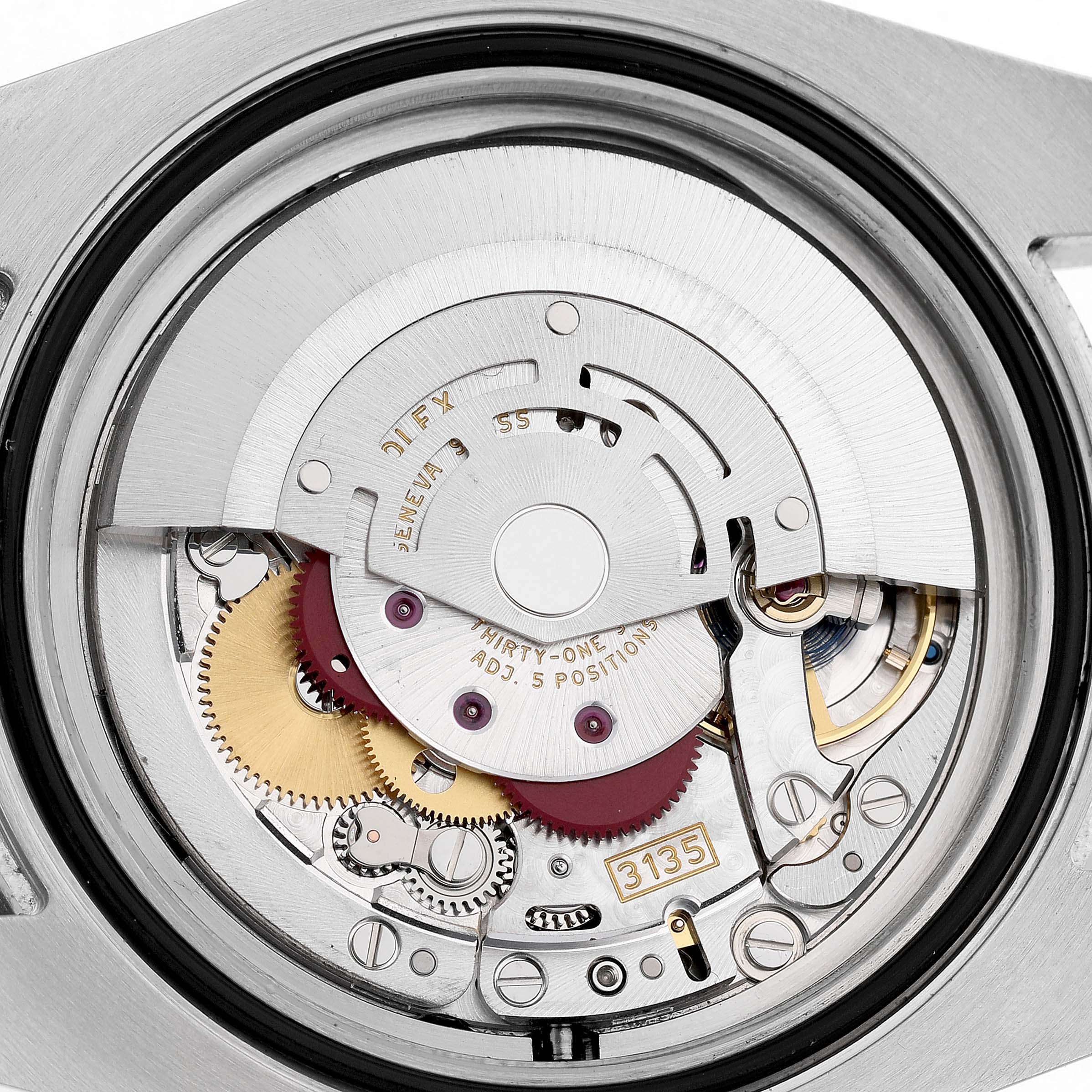 The image shows the movement of a Rolex Submariner 116610 Men's Stainless Steel Black Dial, focusing on the intricate internal gears and mechanisms.