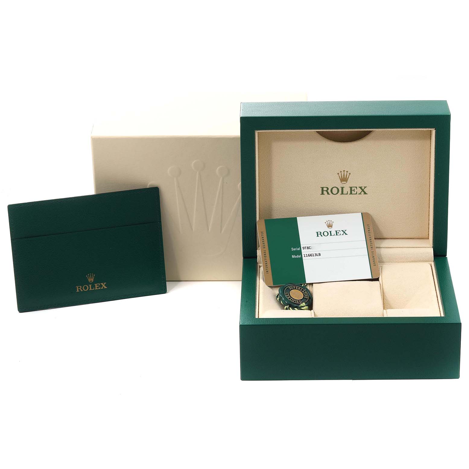 This image shows a Rolex Submariner 116613 Men's Steel and Gold (two tone) Blue Dial 116613 Men's Steel and Gold (two tone) Blue Dial's packaging, including a green box, warranty card, and cardholder.