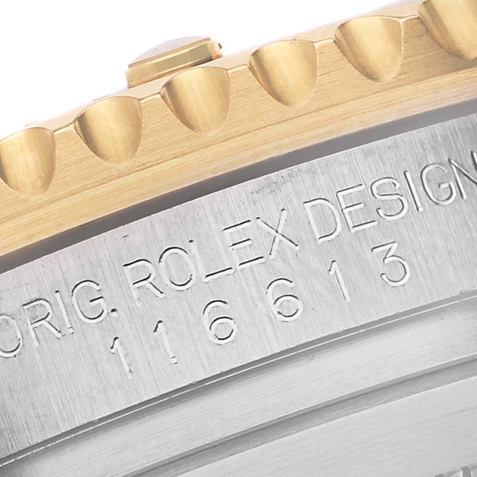 The image displays a close-up of the bezel and case side of the Rolex Submariner 116613 Men's Steel and Gold (two tone) Blue Dial 116613 Men's Steel and Gold (two tone) Blue Dial, highlighting its model number 116613.