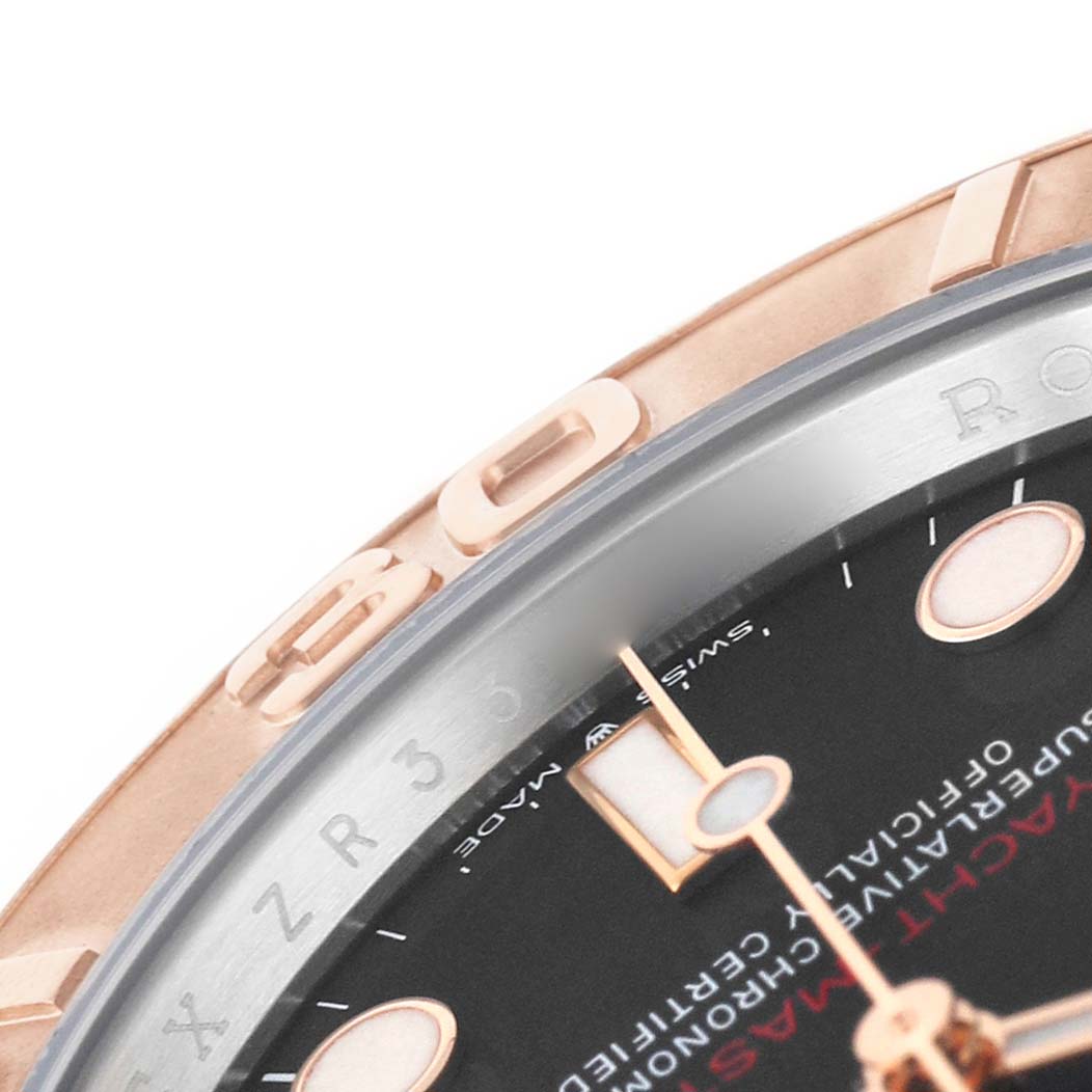 The image shows a close-up of the bezel and part of the dial of the Rolex Yacht-Master 126621 Men's Stainless Steel Black Dial, highlighting indices and text.