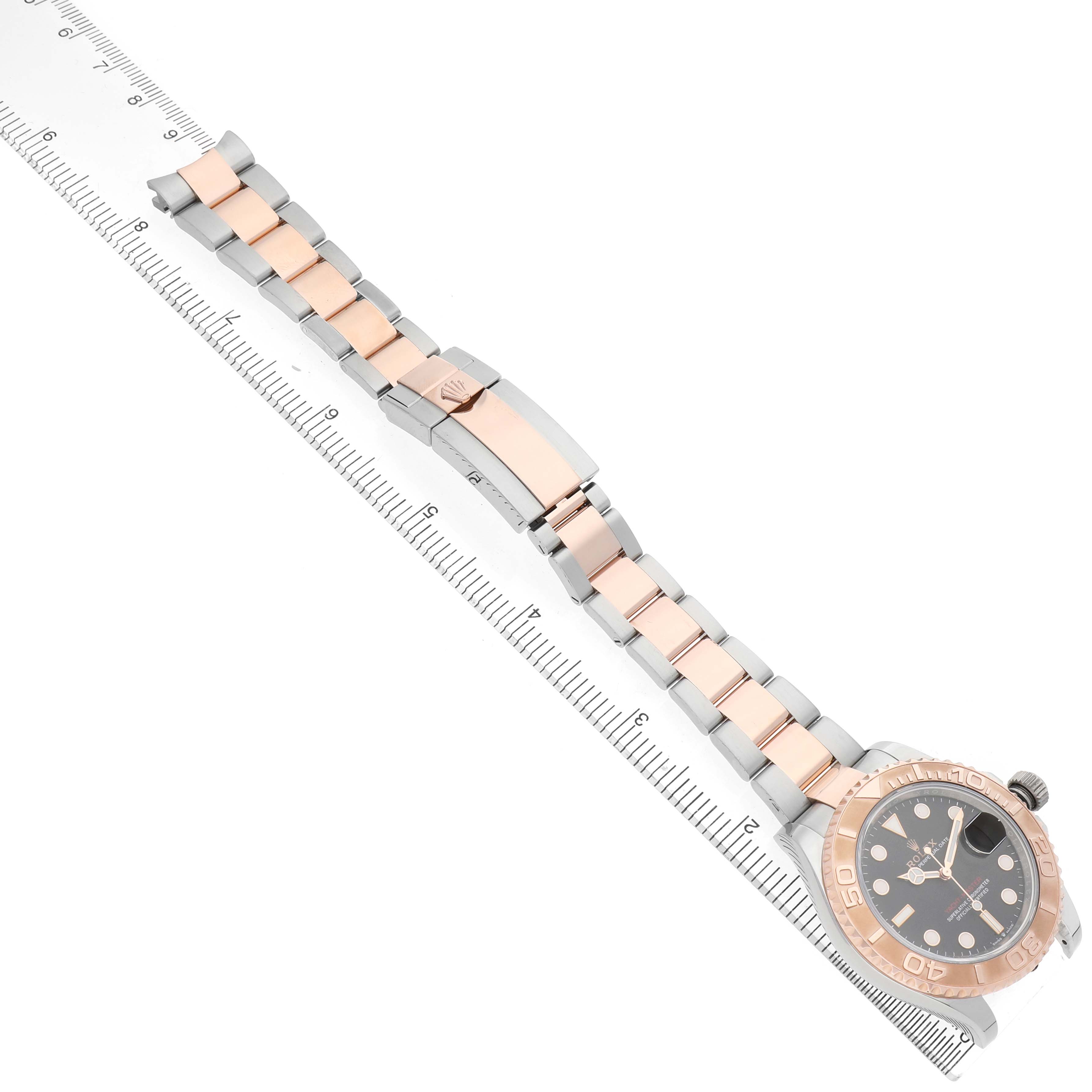 The Rolex Yacht-Master 126621 Men's Stainless Steel Black Dial watch is displayed diagonally, showing the full bracelet and face with a rose gold and silver color scheme.