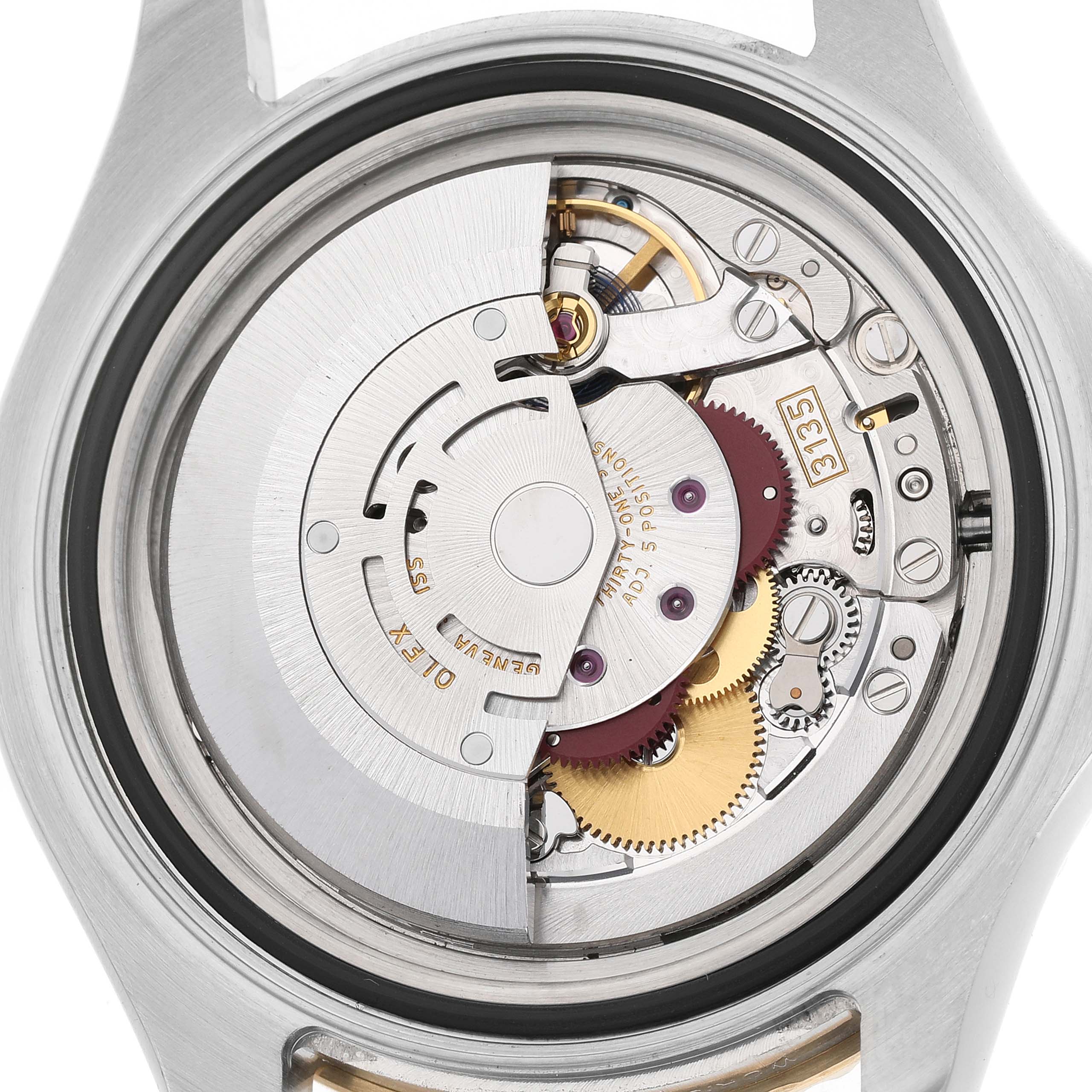 The image shows the movement of a Rolex Yacht-Master 16623 Men's Steel and Gold (two tone) White Dial, highlighting its internal gears and mechanisms from the back.