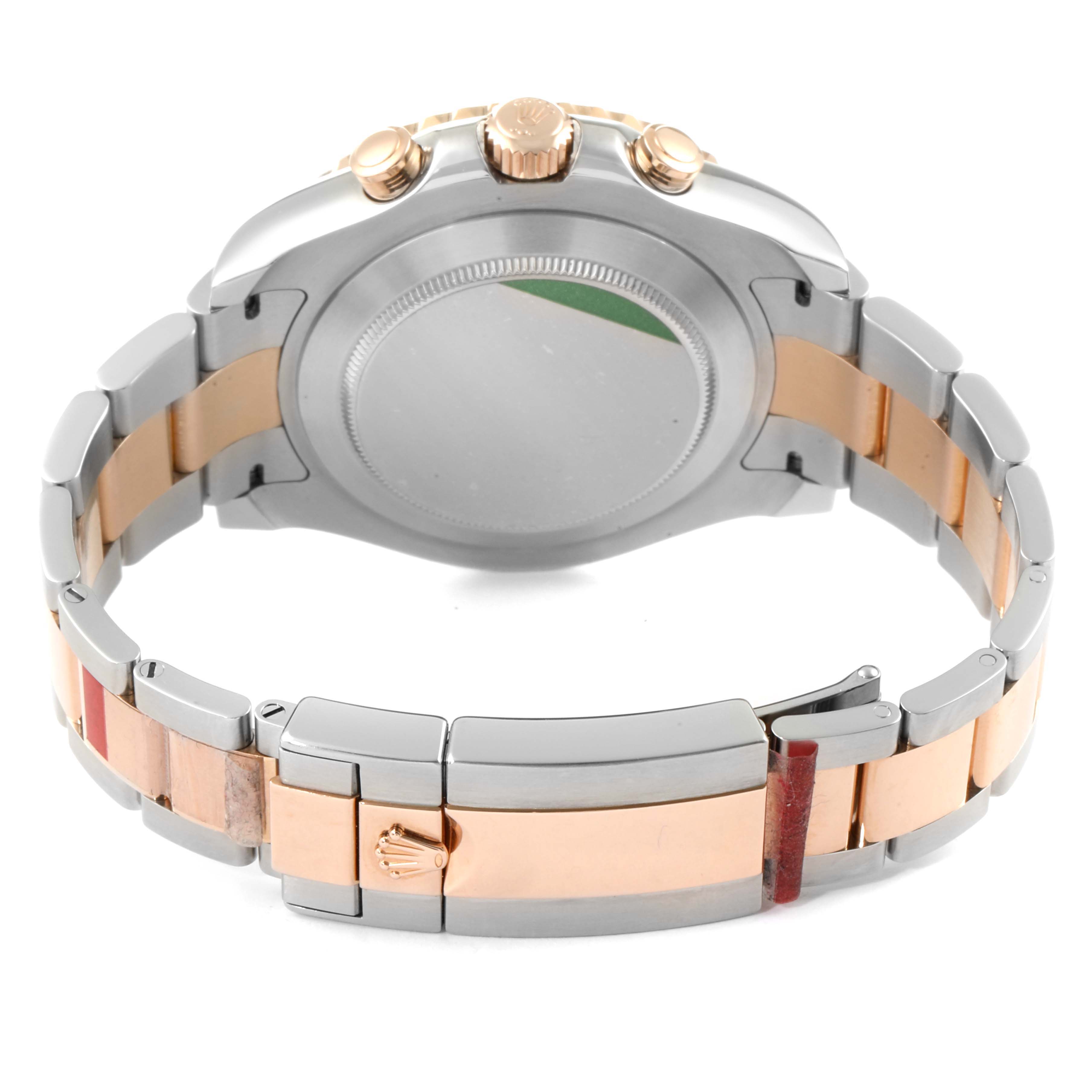 The image shows the back view of a Rolex Yacht-Master 116681 Men
s Steel and Gold (two tone) White Dial 116681 Men
s Steel and Gold (two tone) White Dial watch, highlighting the case back, crown guards, and bracelet clasp.