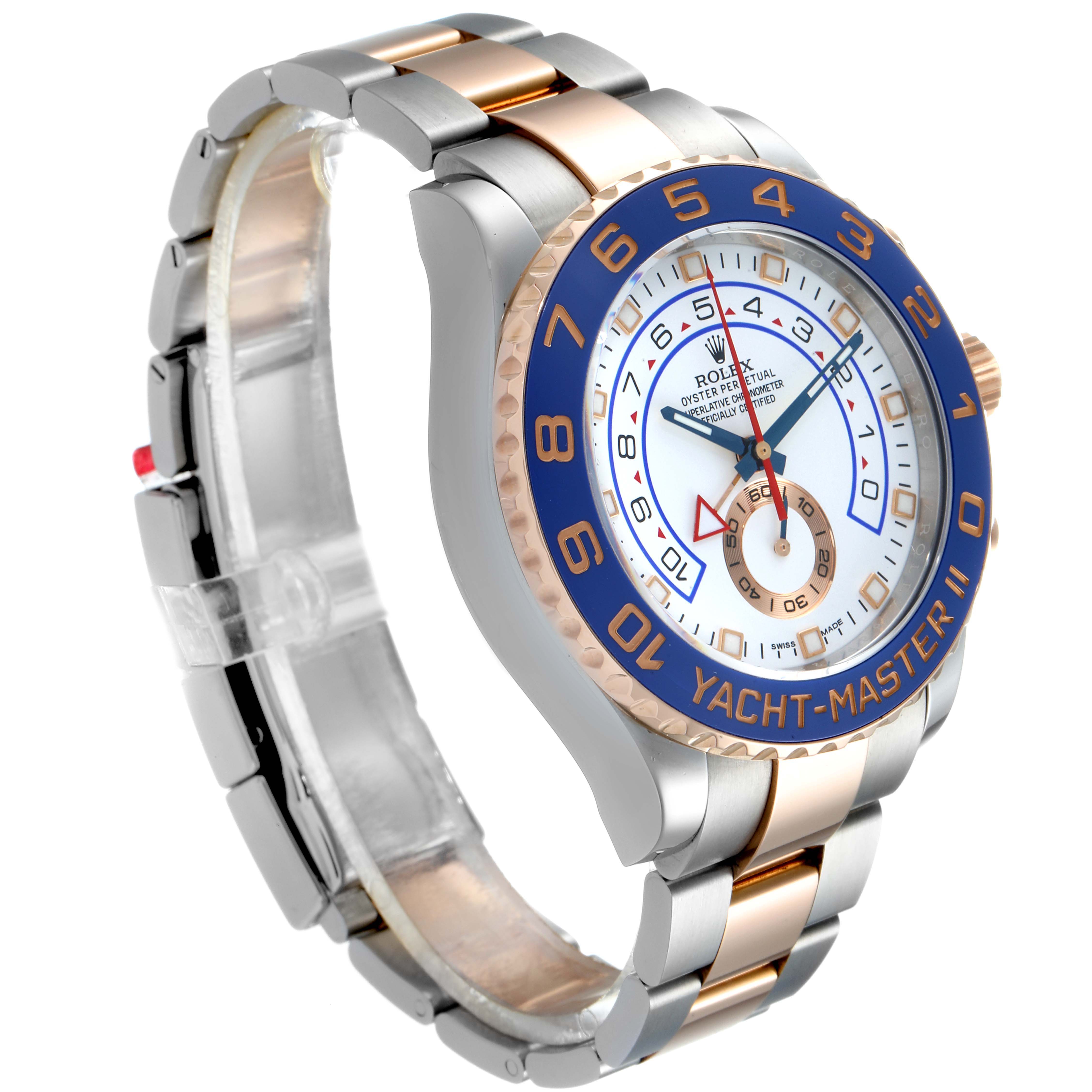 The image shows a Rolex Yacht-Master 116681 Men
s Steel and Gold (two tone) White Dial 116681 Men
s Steel and Gold (two tone) White Dial II watch from a three-quarter front angle, displaying the face and part of the band.