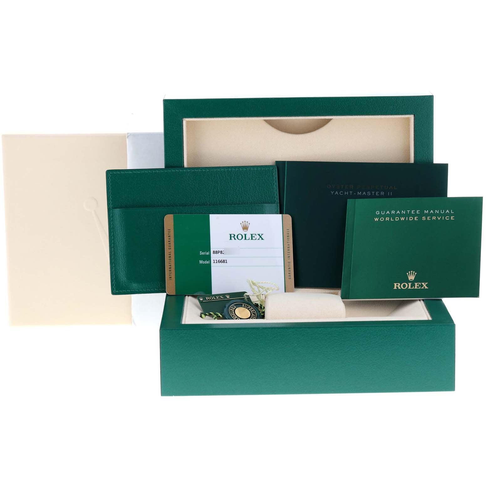 This image shows the Rolex Yacht-Master 116681 Men
s Steel and Gold (two tone) White Dial 116681 Men
s Steel and Gold (two tone) White Dial watch box, guarantee card, manuals, and packaging accessories from a front angle.