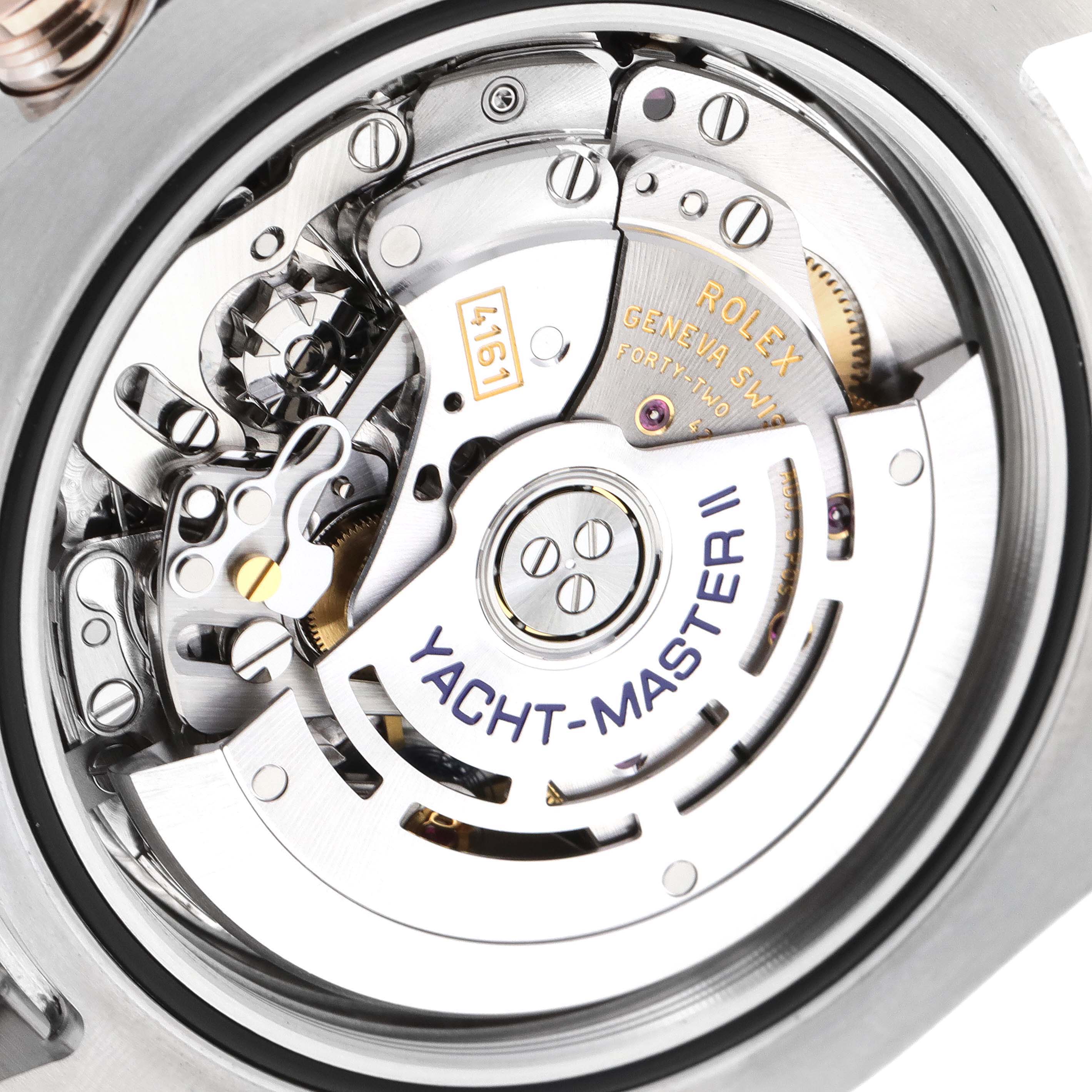 This image shows the internal mechanism of a Rolex Yacht-Master 116681 Men
s Steel and Gold (two tone) White Dial 116681 Men
s Steel and Gold (two tone) White Dial II watch from a close-up angle.