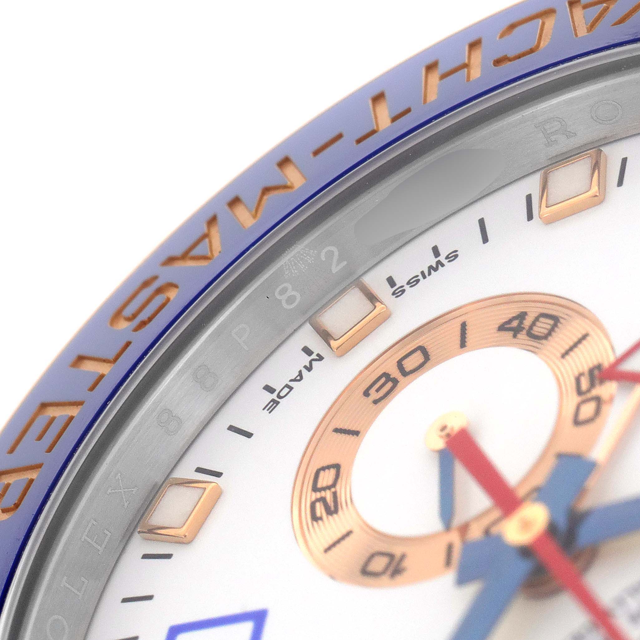 This close-up image shows part of the dial, bezel, and hands of the Rolex Yacht-Master 116681 Men
s Steel and Gold (two tone) White Dial 116681 Men
s Steel and Gold (two tone) White Dial watch.