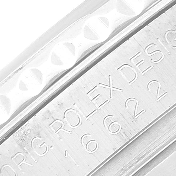 This close-up image shows the side engraving and details of the bezel on a Rolex Yacht-Master 16622 Men's Stainless Steel Silver Dial 16622 Men's Stainless Steel Silver Dial watch.