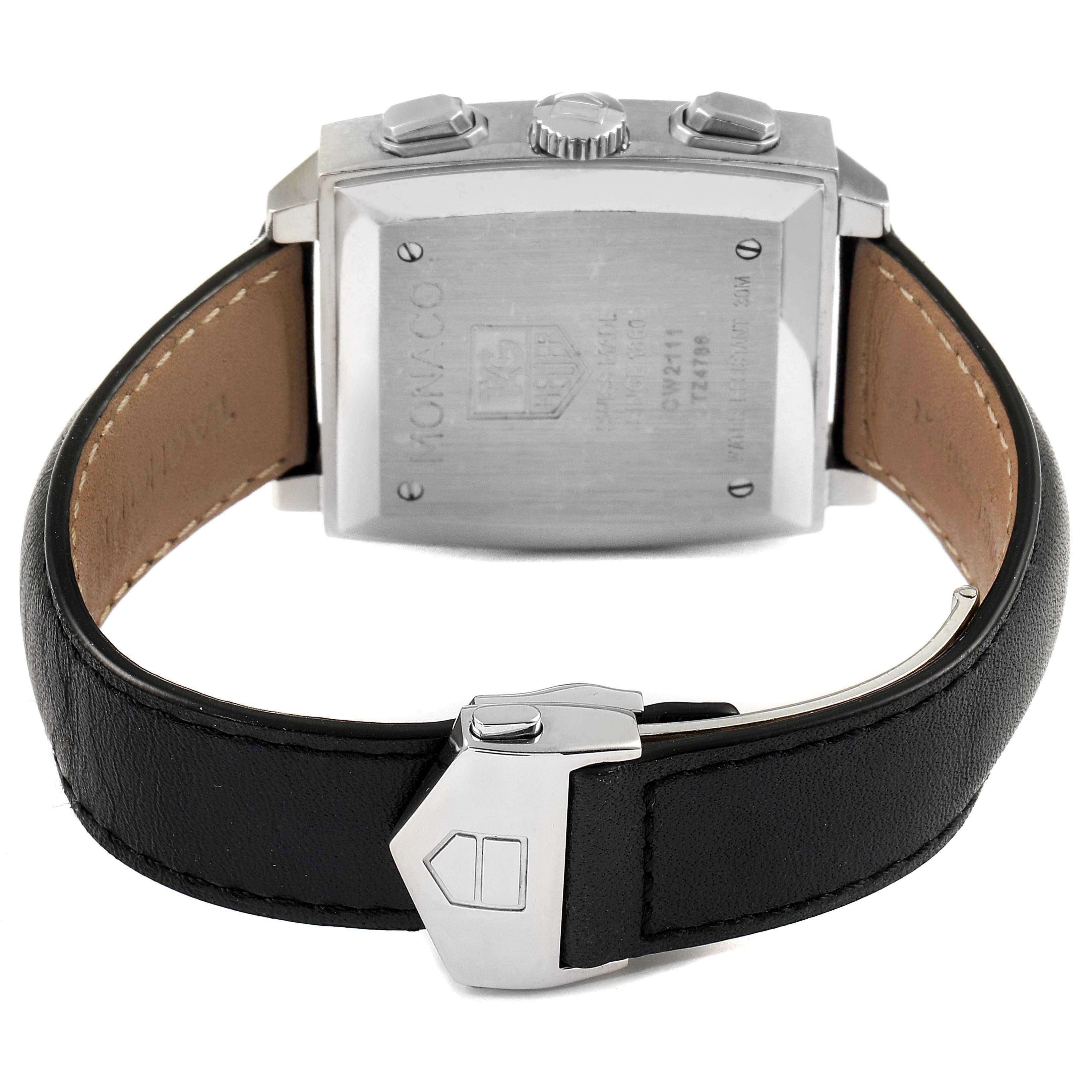 The image shows the back view, clasp, and side buttons of a Tag Heuer Monaco CW2111 Men's Stainless Steel Black Dial CW2111 Men's Stainless Steel Black Dial watch, featuring a black leather strap.