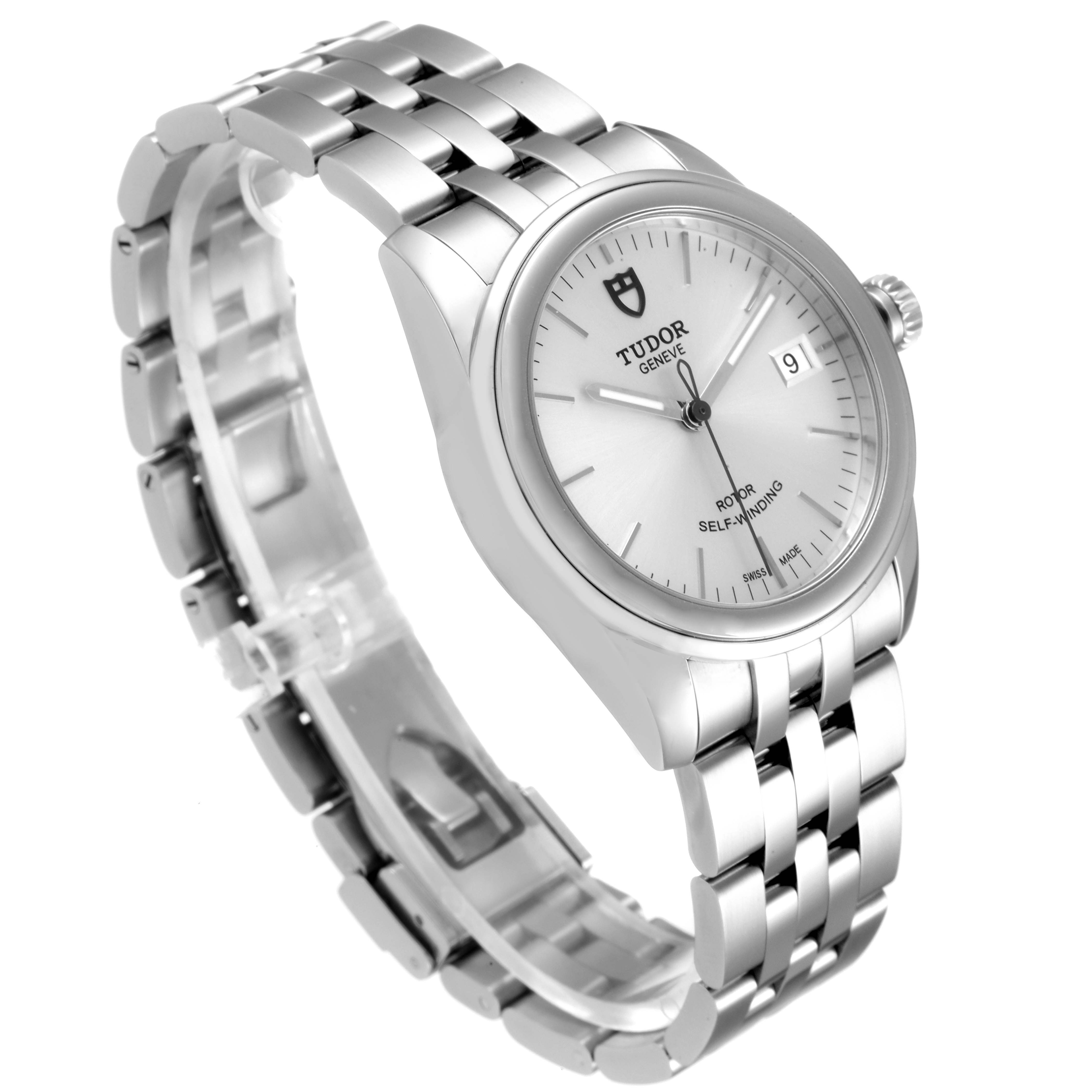 The Tudor Glamour M55000-0001 Men's Stainless Steel Silver Dial M55000-0001 Men's Stainless Steel Silver Dial watch is shown at an oblique angle, displaying the face, case, and metal bracelet.