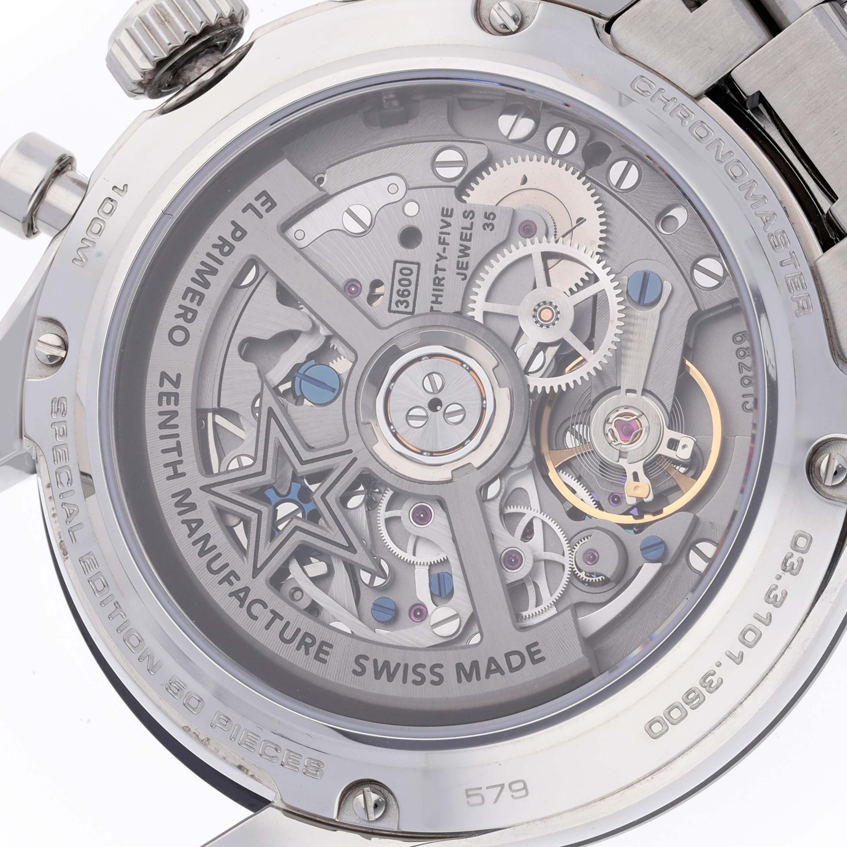 This image shows the back of the Zenith Chronomaster 03.3101.3600 Men's Stainless Steel Black Dial 03.3101.3600 Men's Stainless Steel Black Dial watch, displaying its intricate movement and "El Primero" inscription.