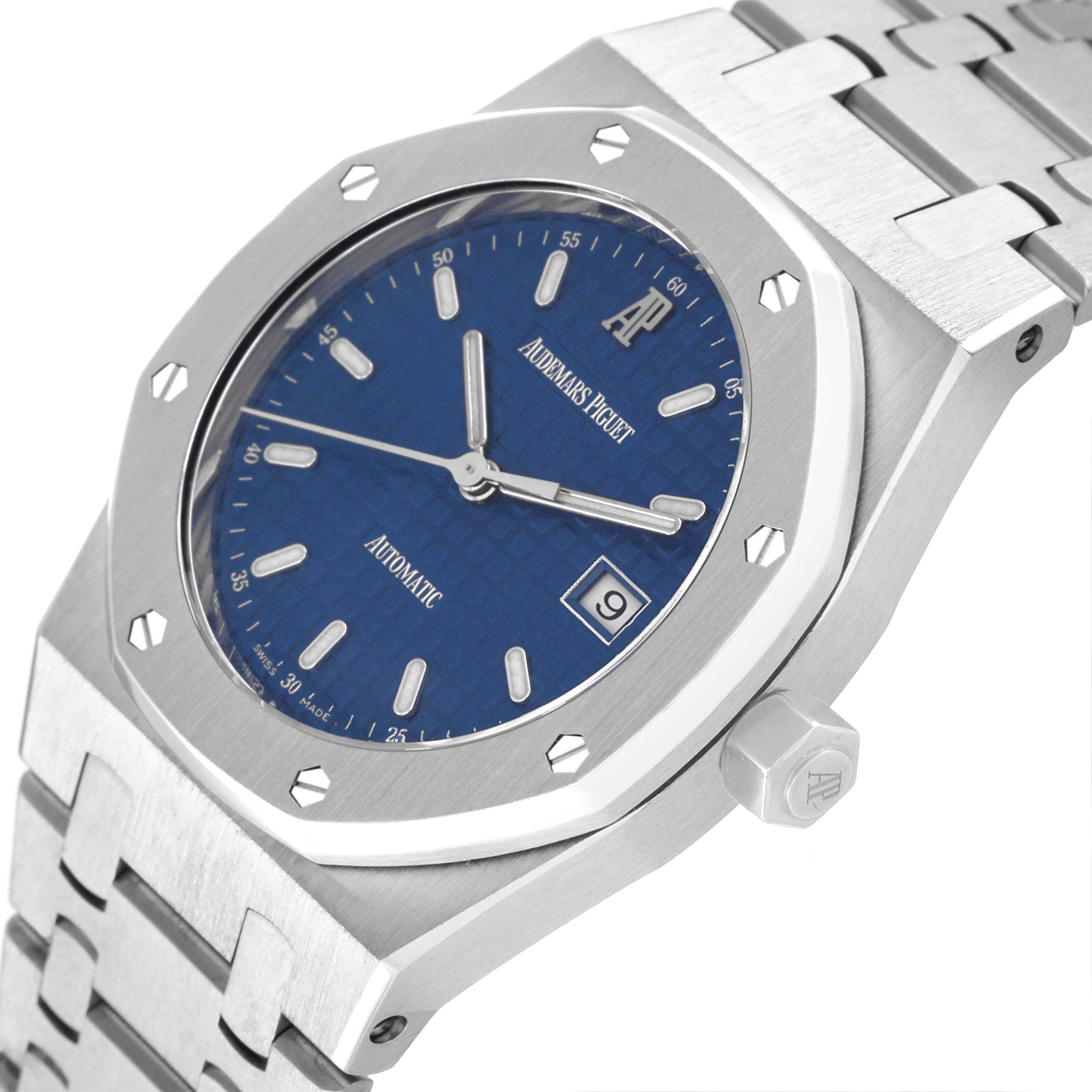 The image displays a slight angle view of the Royal Oak model by Audemars Piguet, showing the dial, bezel, and part of the bracelet.