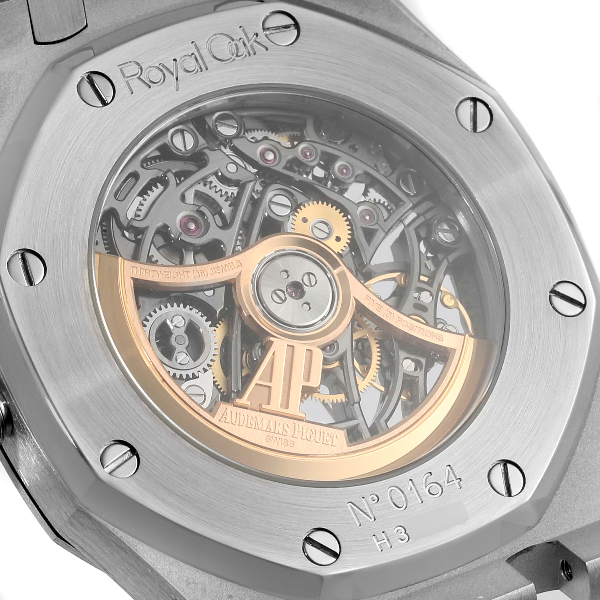 The image shows the caseback view of a Royal Oak model by Audemars Piguet, highlighting its intricate movement mechanism.