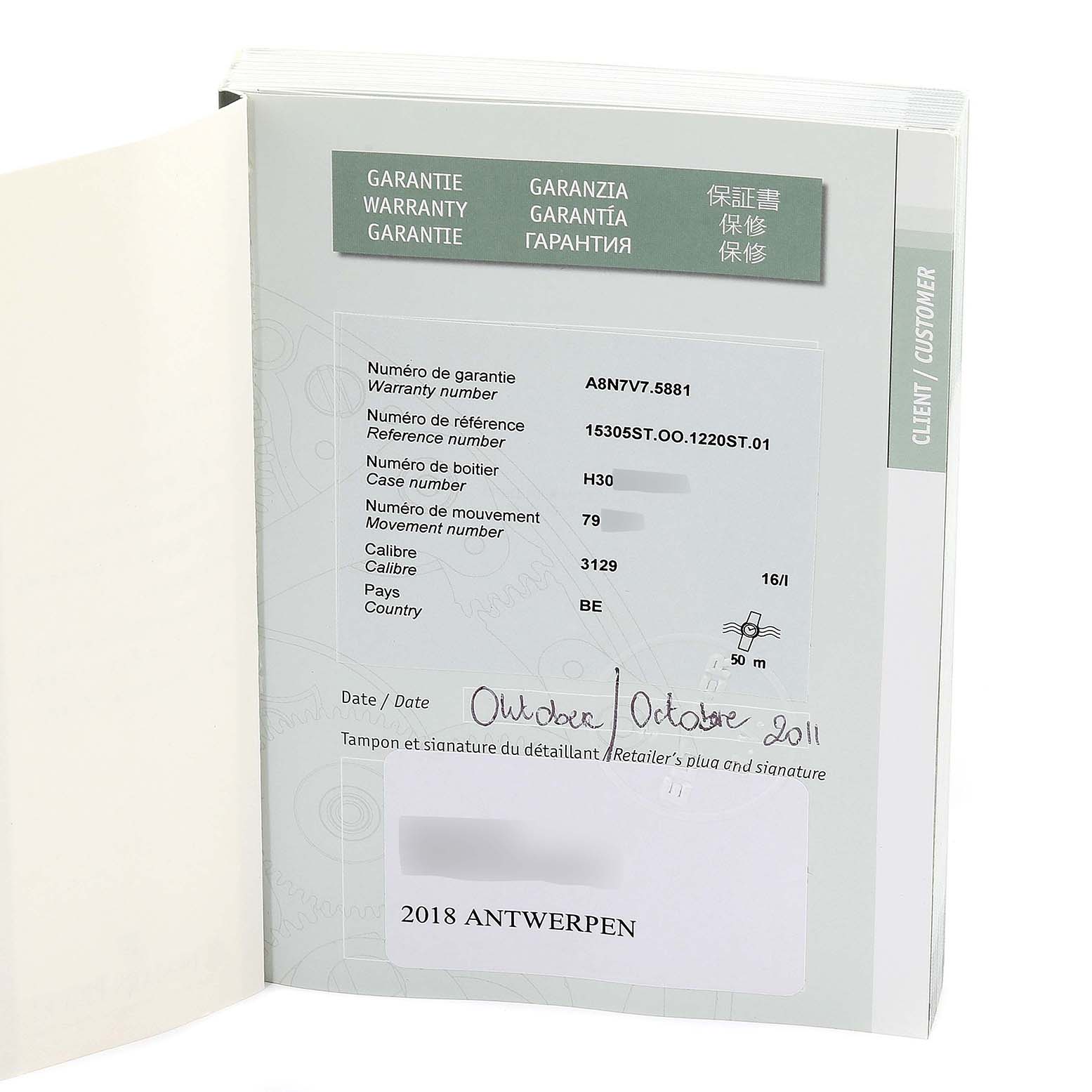 The image shows a warranty booklet open to a page listing details of an Audemars Piguet Royal Oak 15305ST.OO.1220ST.01 Men's Stainless Steel Transparent Dial 15305ST.OO.1220ST.01 Men's Stainless Steel Transparent Dial model.