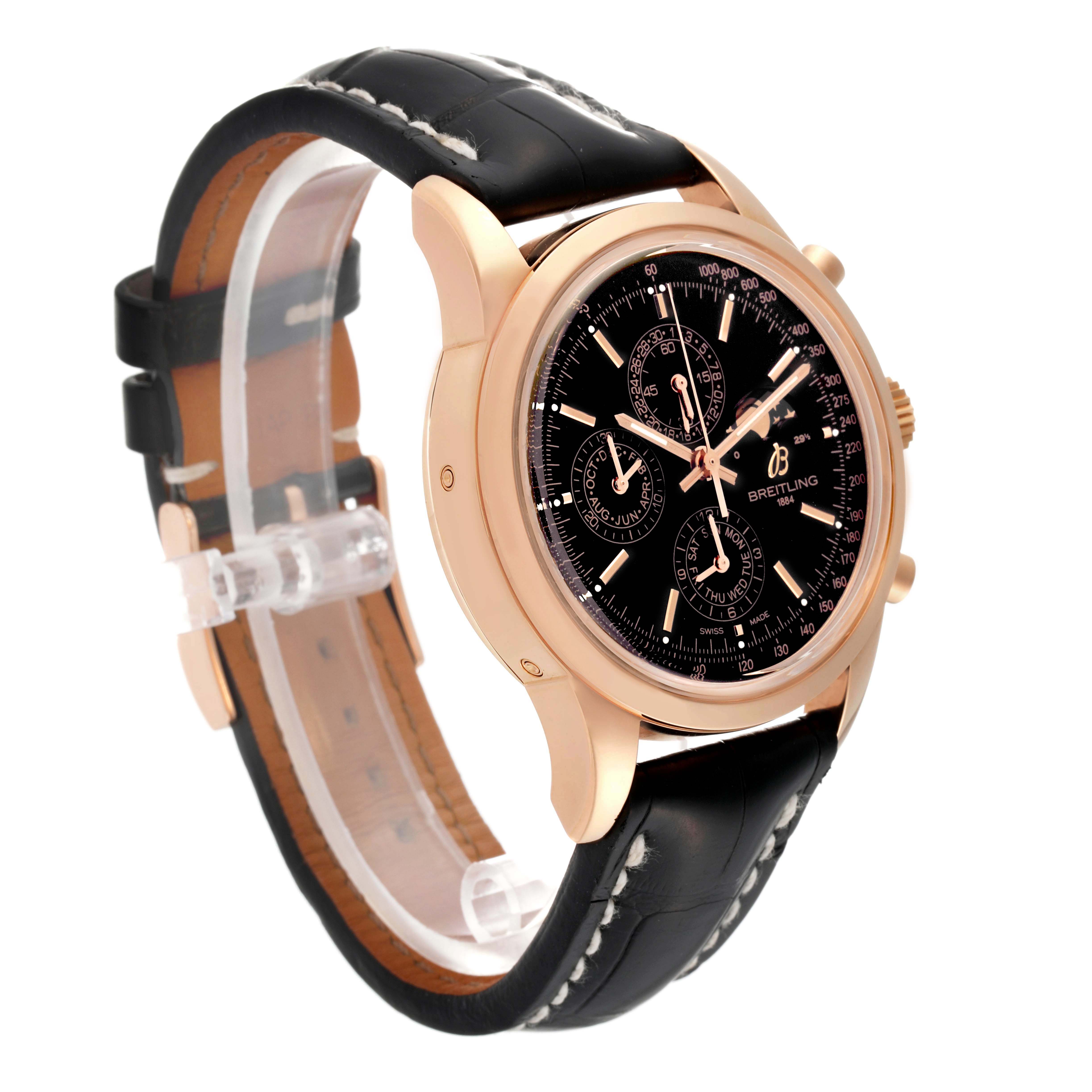 The Breitling Transocean R19310 Men's Rose Gold Black Dial watch is shown from a three-quarter angle, highlighting its face, case, and leather strap.