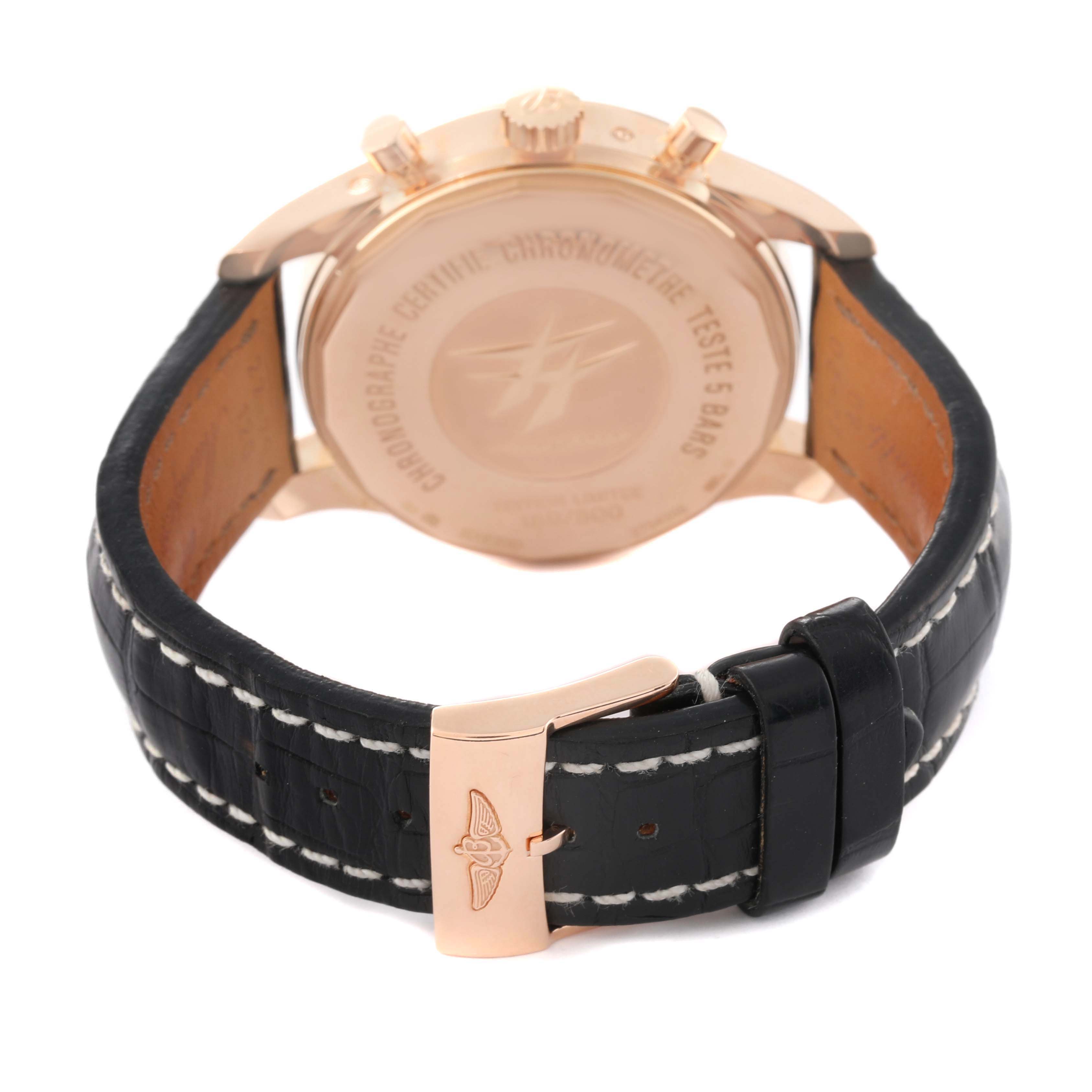 The image shows the back and clasp of a Breitling Transocean R19310 Men's Rose Gold Black Dial watch, highlighting the case back and leather strap.