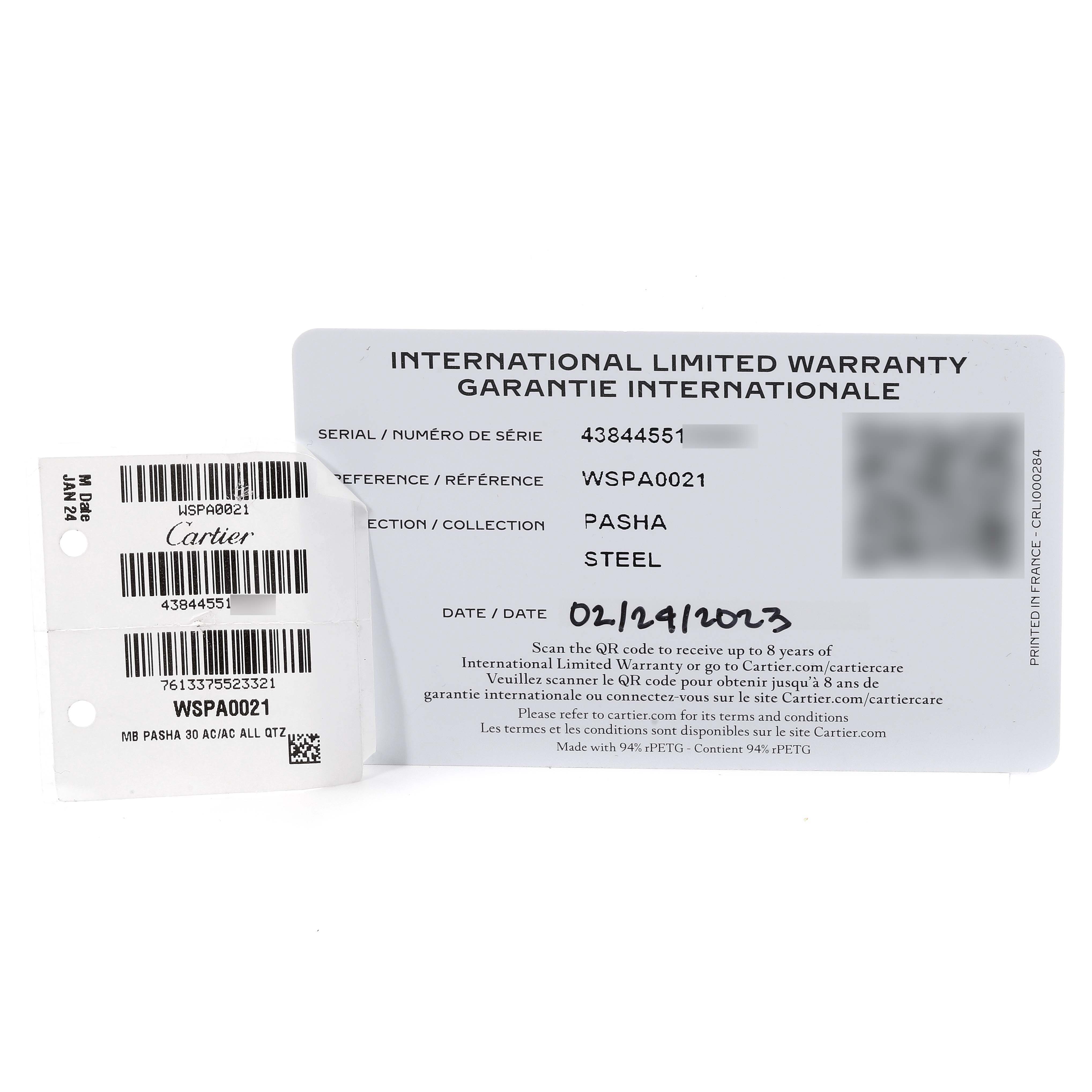 The image shows the warranty card and label of a Cartier Pasha WSPA0021 Women's Stainless Steel Silver Dial WSPA0021 Women's Stainless Steel Silver Dial watch, including model, serial number, and purchase date.