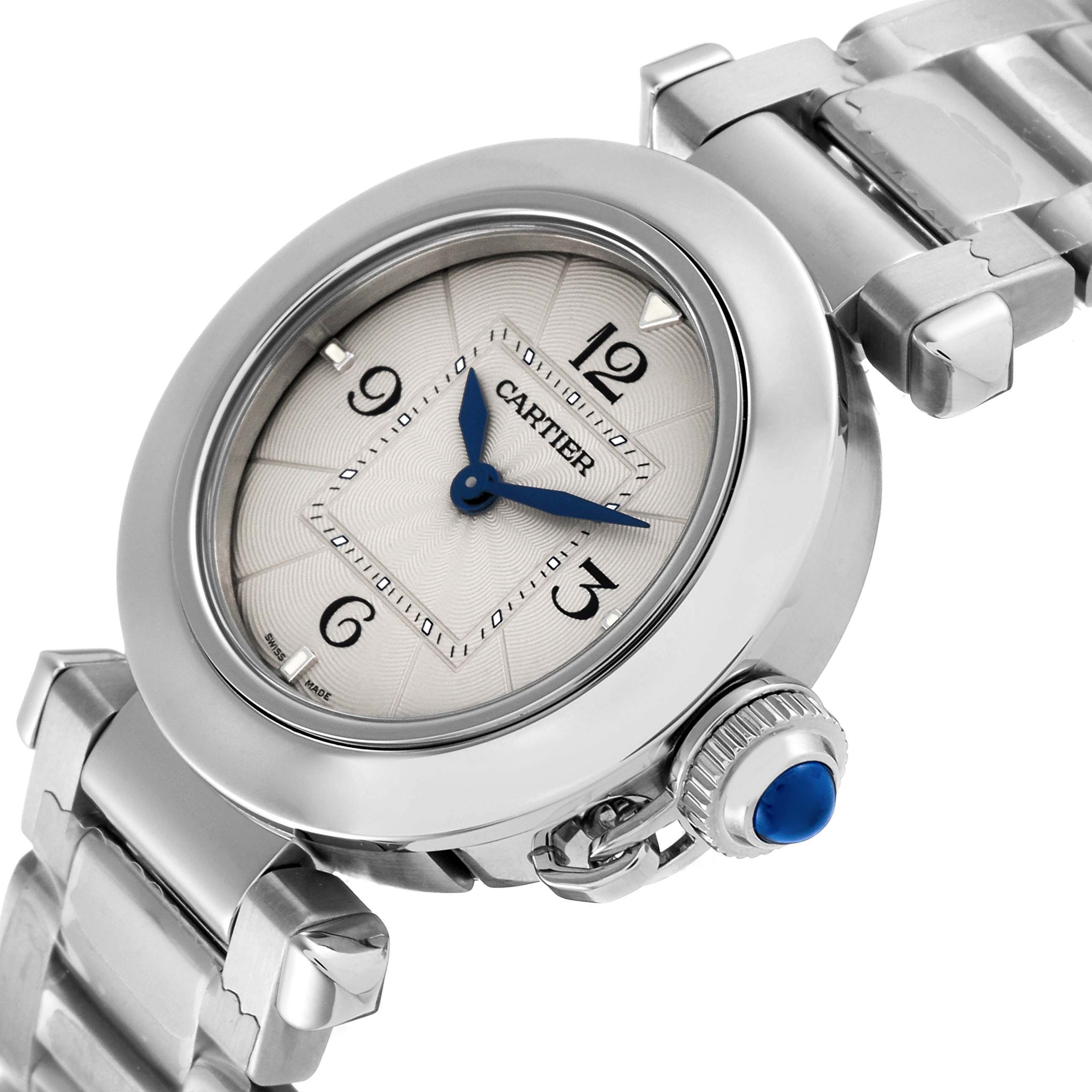 The image shows a Cartier Pasha WSPA0021 Women's Stainless Steel Silver Dial WSPA0021 Women's Stainless Steel Silver Dial watch from a three-quarter angle, highlighting its face, crown, and metal bracelet.
