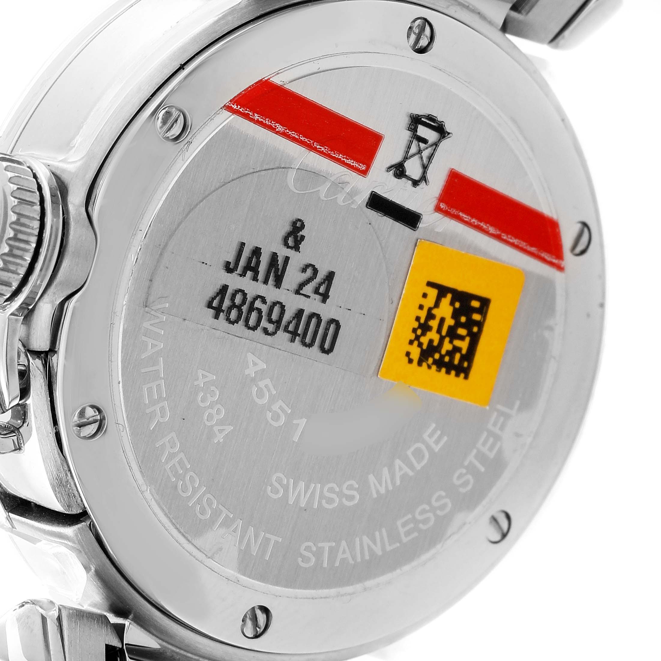 This image shows the back of the Cartier Pasha WSPA0021 Women's Stainless Steel Silver Dial WSPA0021 Women's Stainless Steel Silver Dial watch, displaying the case back with serial numbers and inscriptions.