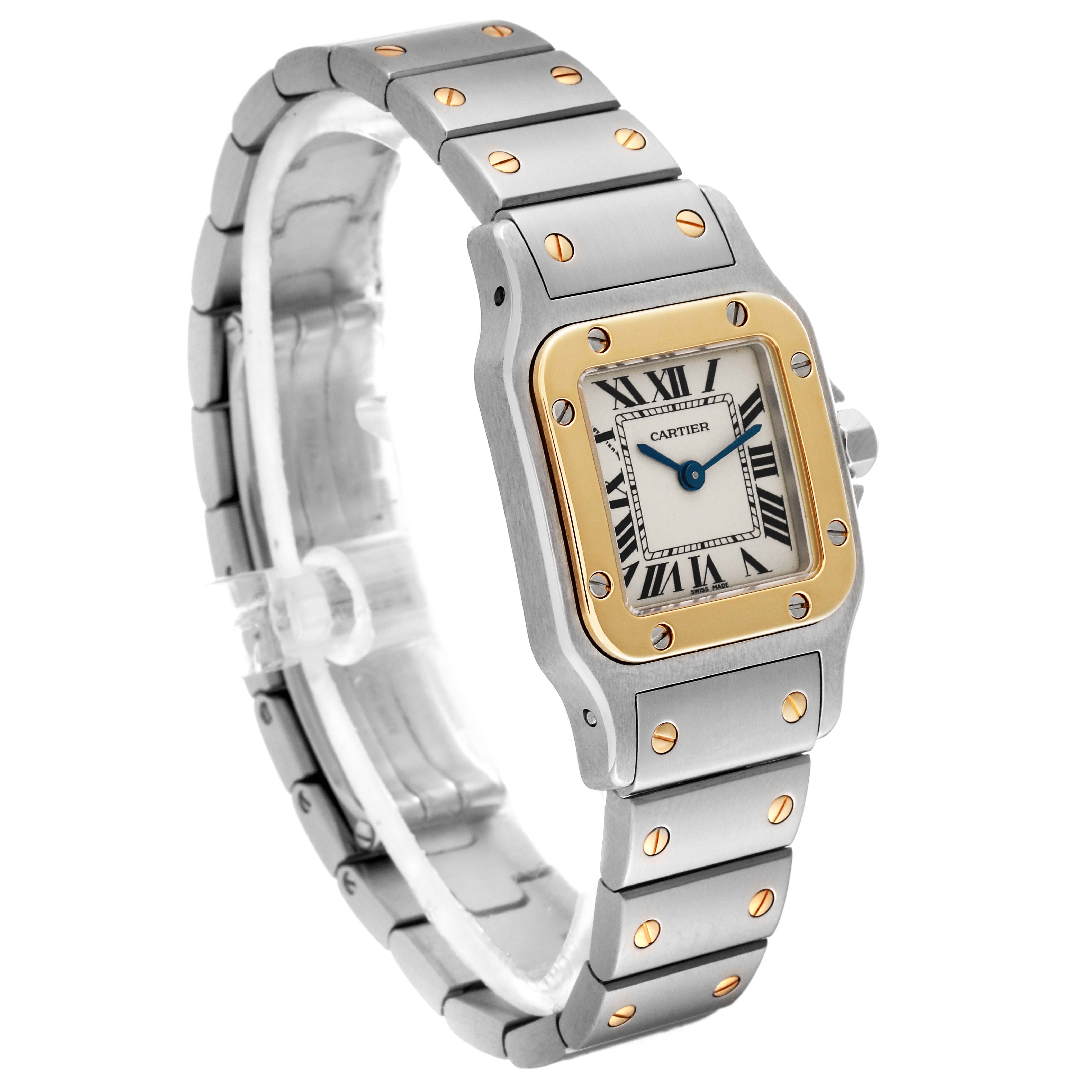 This image shows a Cartier Santos W20012C4 Women's Stainless Steel Silver Dial W20012C4 Women's Stainless Steel Silver Dial watch from an angled top view, highlighting its two-tone metal bracelet and square face with Roman numerals.