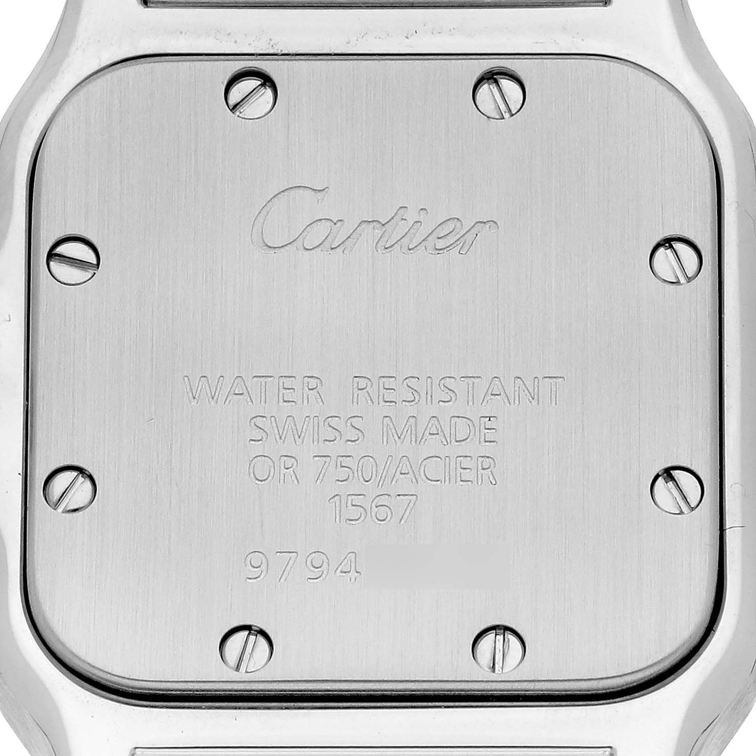 This image shows the back case of a Cartier Santos W20012C4 Women's Stainless Steel Silver Dial W20012C4 Women's Stainless Steel Silver Dial watch, displaying engravings and screws.
