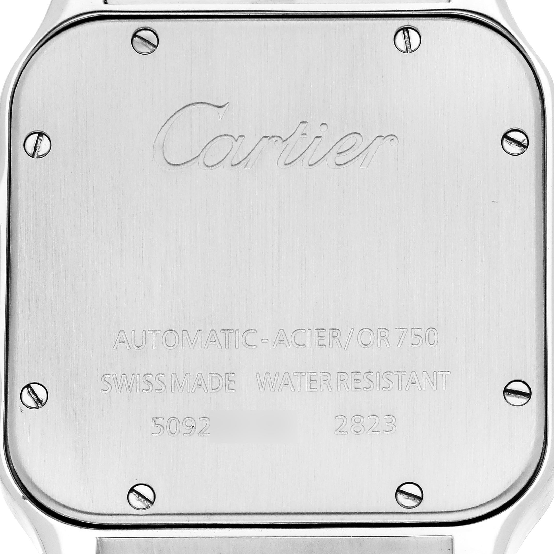 The image shows the back case of the Cartier Santos W20099C4 Men
s Steel and Gold (two tone) Silver Dial W20099C4 Men
s Steel and Gold (two tone) Silver Dial watch, displaying engravings and screws.