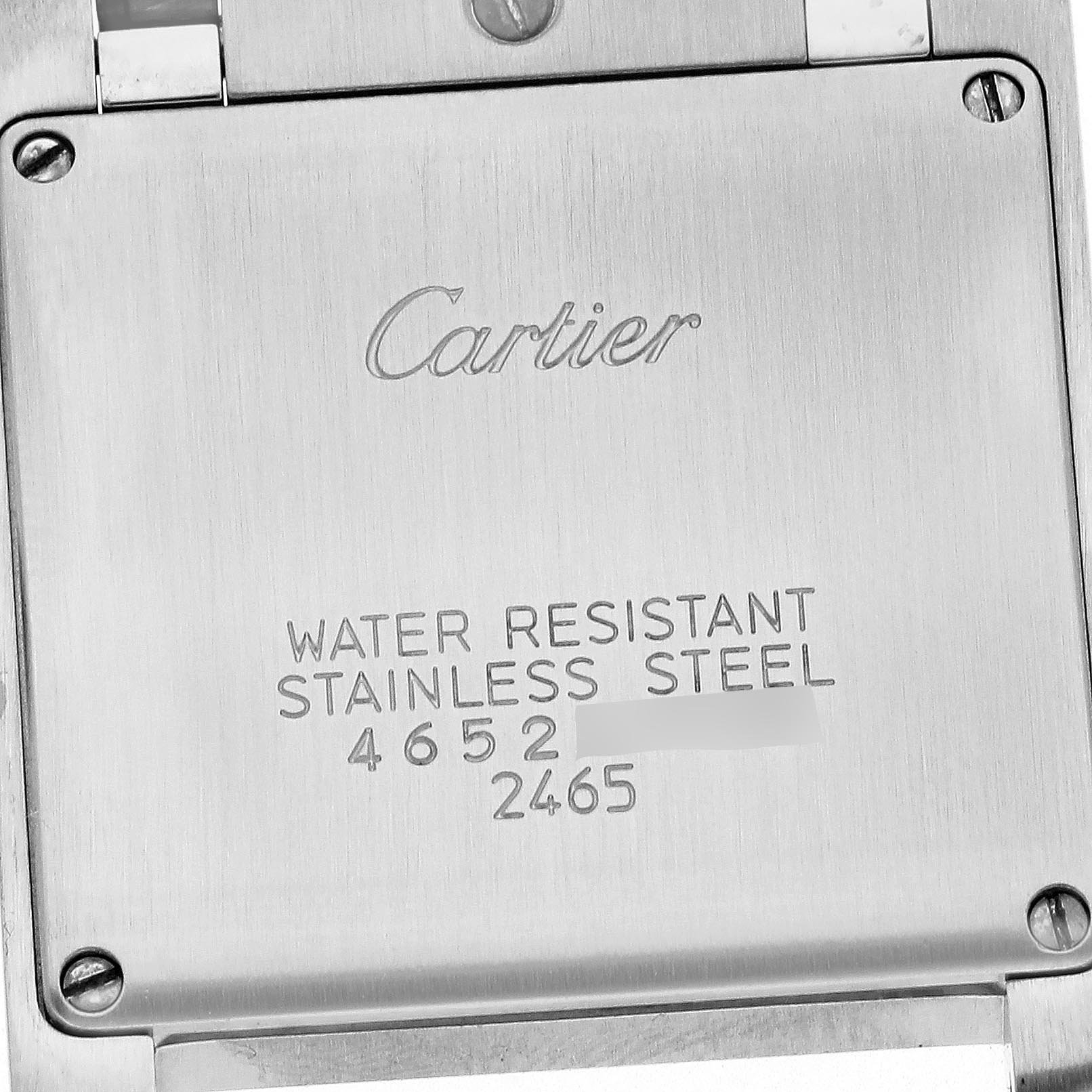 The image shows the back of a Cartier Tank Francaise W51011Q3 Women's Stainless Steel Silver Dial W51011Q3 Women's Stainless Steel Silver Dial watch, displaying the brand's engraving and water resistance details.