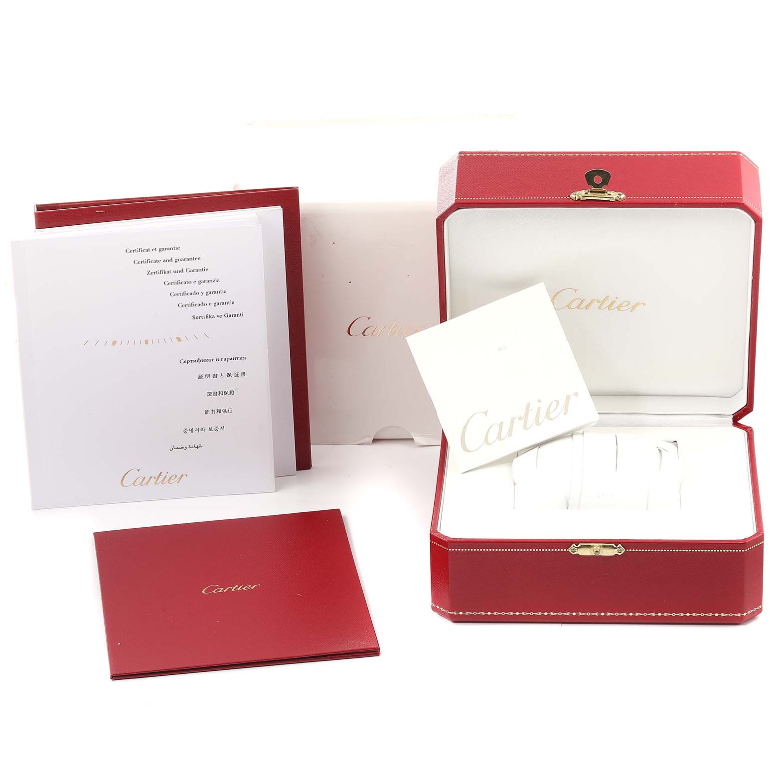The image shows the packaging and documentation for a Cartier Tank Francaise WE110006 Women's Stainless Steel Silver Dial WE110006 Women's Stainless Steel Silver Dial watch, including the watch box, manuals, and certificates.