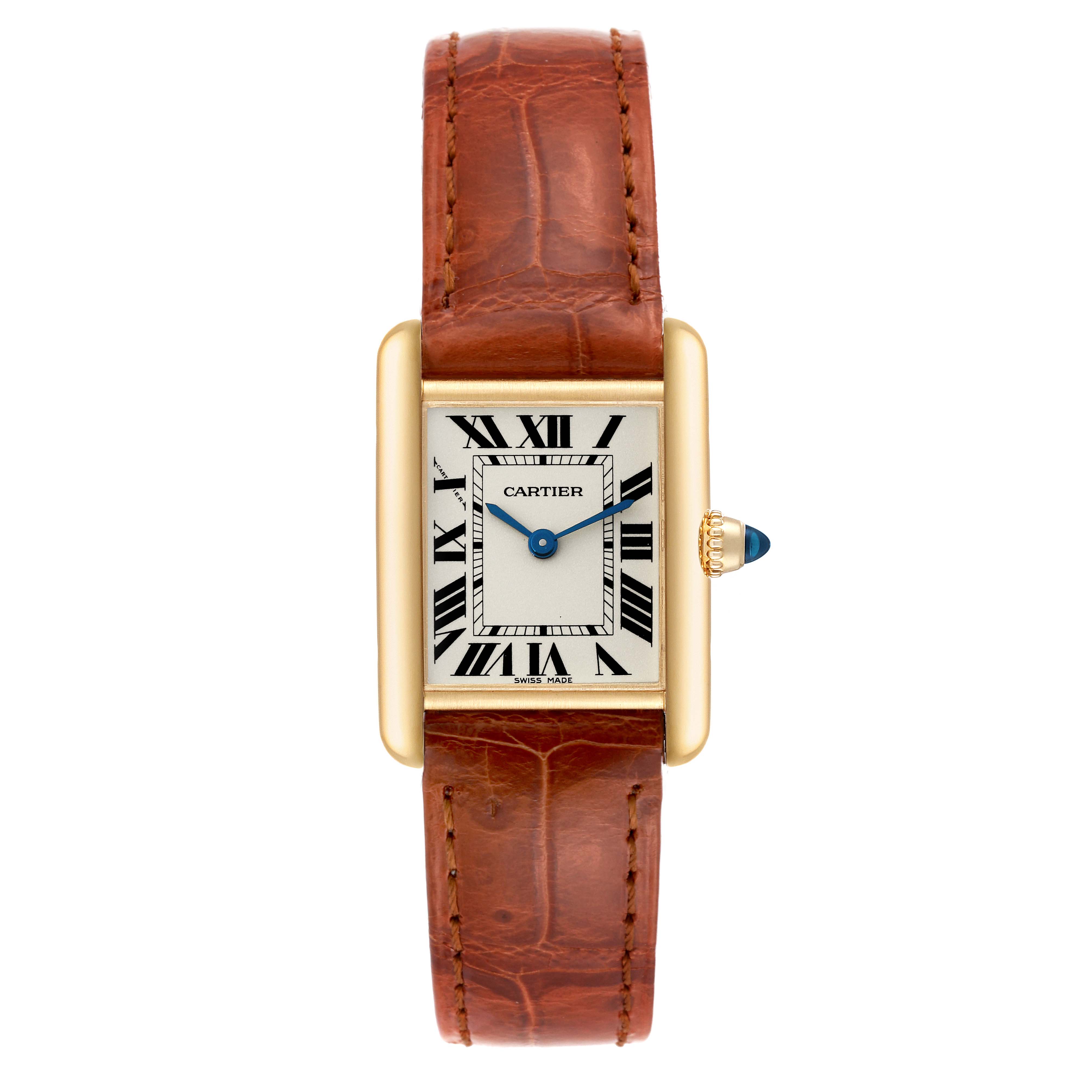 The Cartier Tank Louis W1529856 Women's Yellow Gold Silver Dial W1529856 Women's Yellow Gold Silver Dial watch is shown from a top-down angle, displaying its rectangular dial, gold case, and brown leather strap.