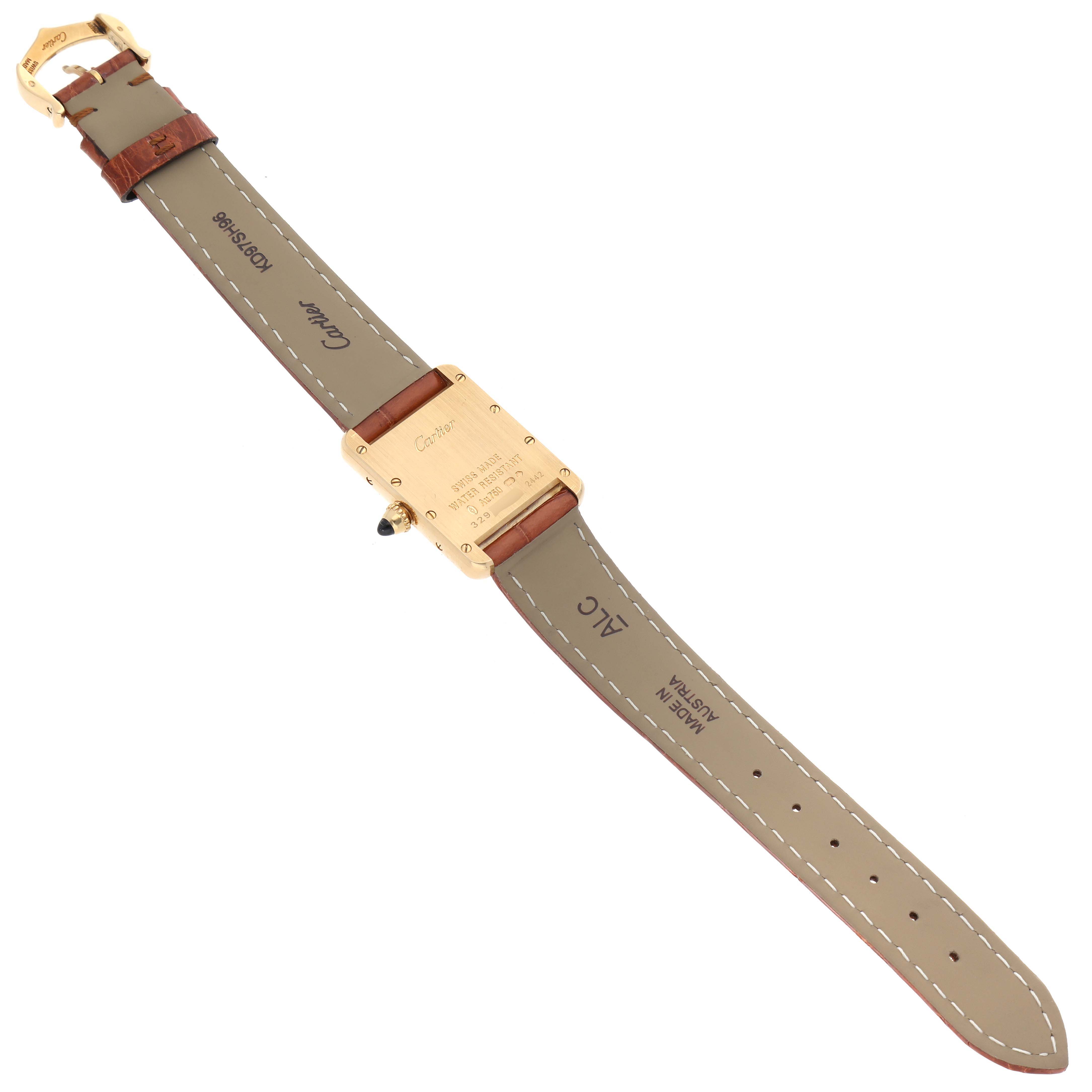 This image shows the backside of the Cartier Tank Louis W1529856 Women's Yellow Gold Silver Dial W1529856 Women's Yellow Gold Silver Dial watch with its strap extended and resting flat.