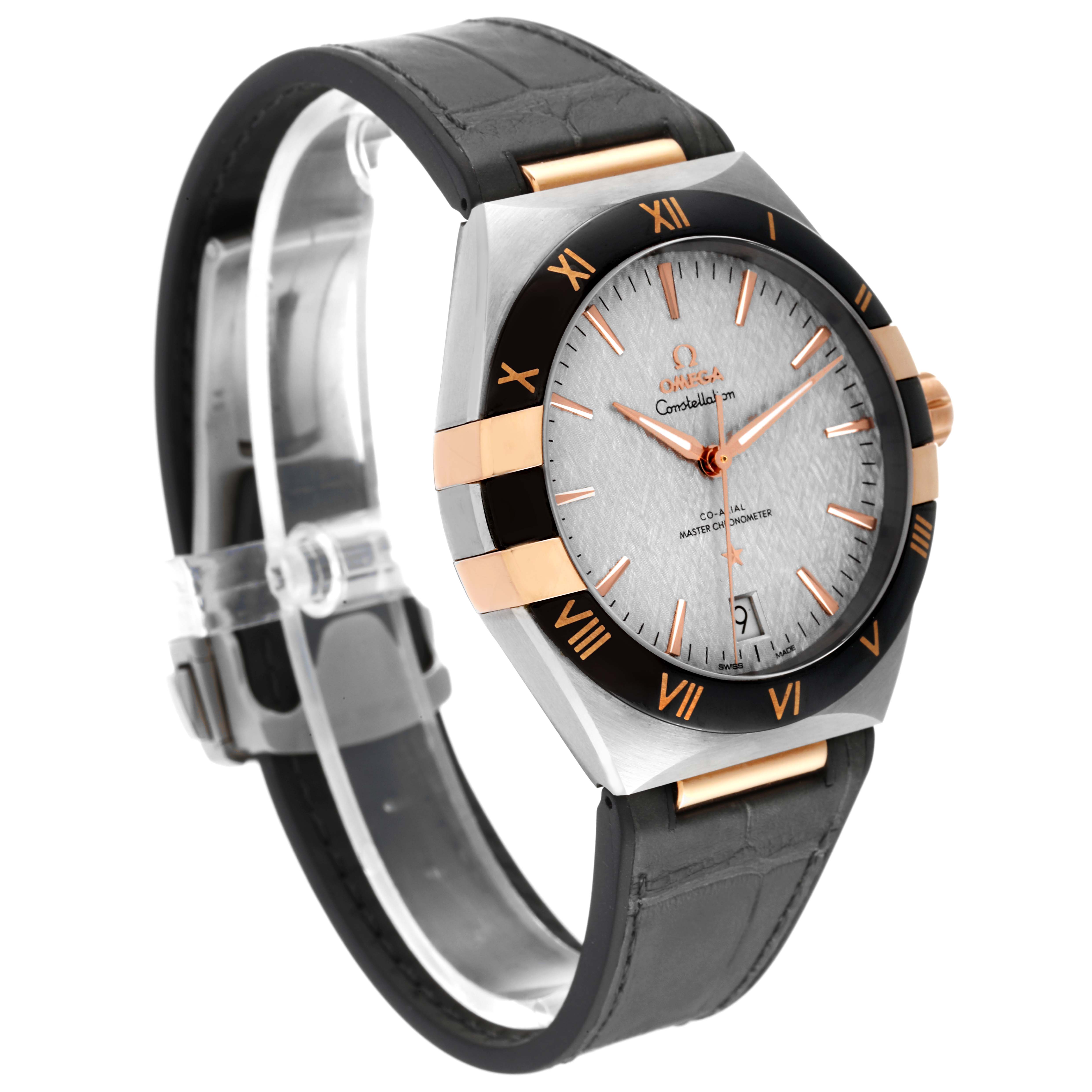 The image shows an angled view of an Omega Constellation 131.23.41.21.06.001 Men's Steel and Gold (two tone) Grey Dial 131.23.41.21.06.001 Men's Steel and Gold (two tone) Grey Dial watch, focusing on its face, bezel, and strap.