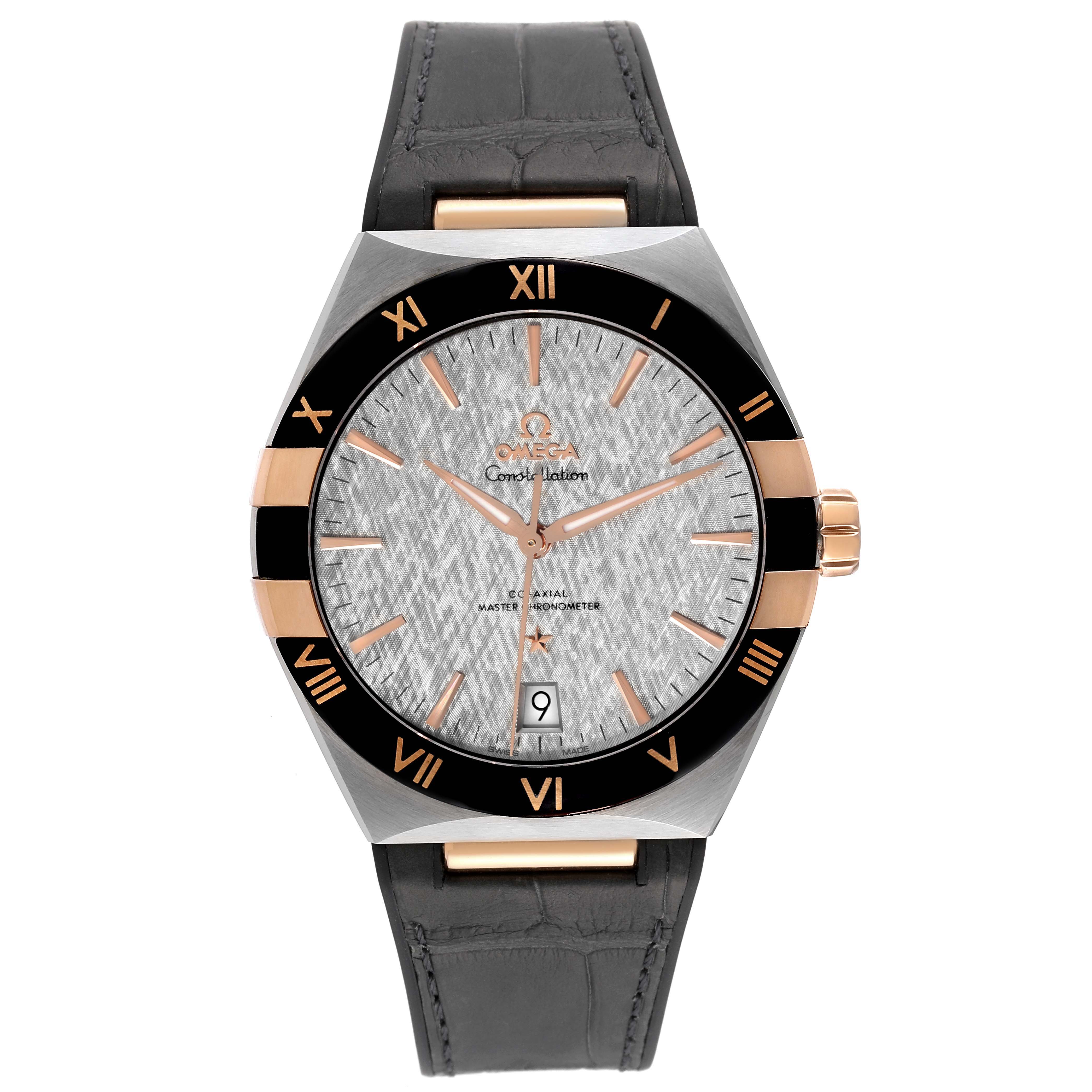 The image shows a front view of an Omega Constellation 131.23.41.21.06.001 Men's Steel and Gold (two tone) Grey Dial 131.23.41.21.06.001 Men's Steel and Gold (two tone) Grey Dial watch, highlighting the dial, bezel, crown, and leather strap.