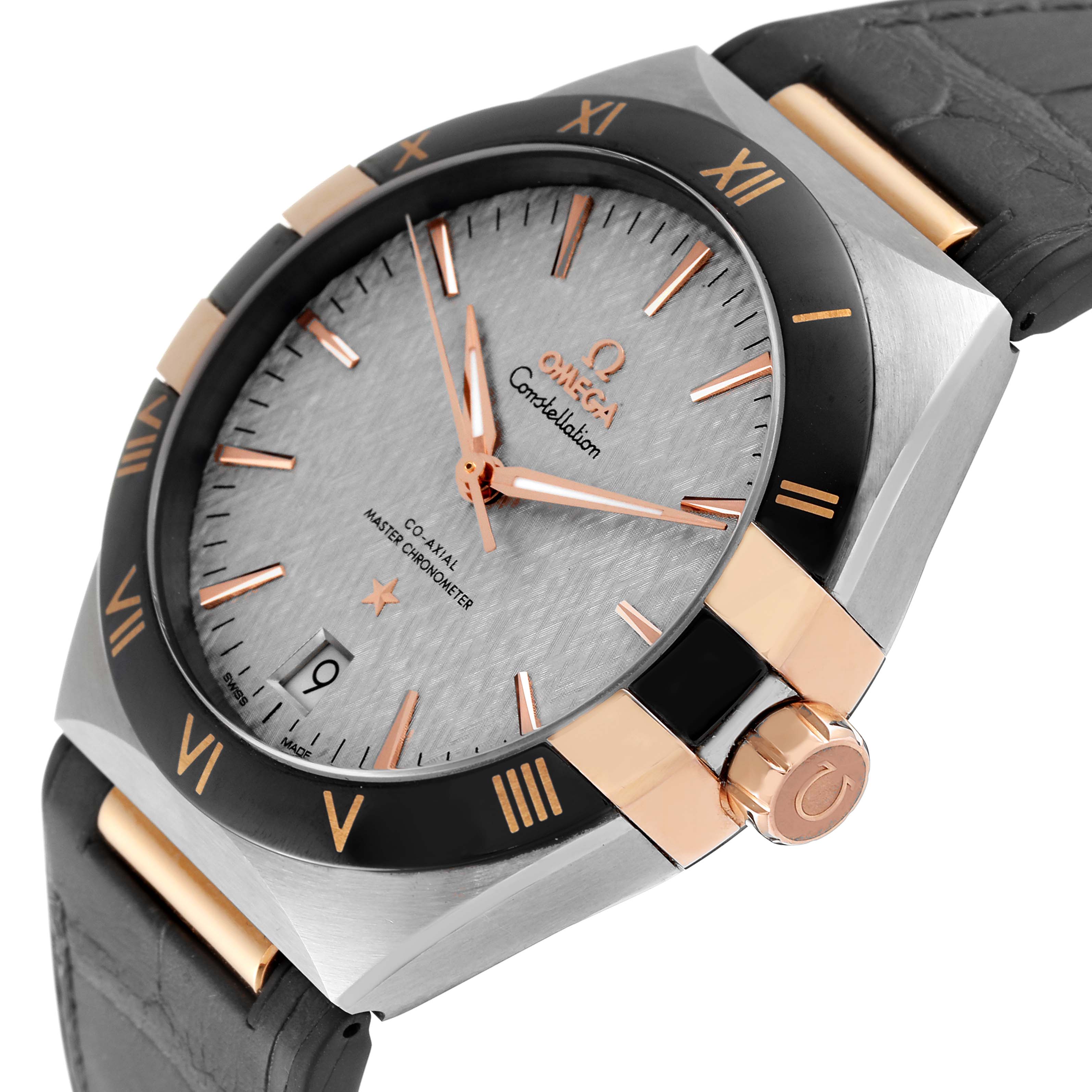 The image shows the dial, bezel, and crown of an Omega Constellation 131.23.41.21.06.001 Men's Steel and Gold (two tone) Grey Dial 131.23.41.21.06.001 Men's Steel and Gold (two tone) Grey Dial watch from a tilted angle.
