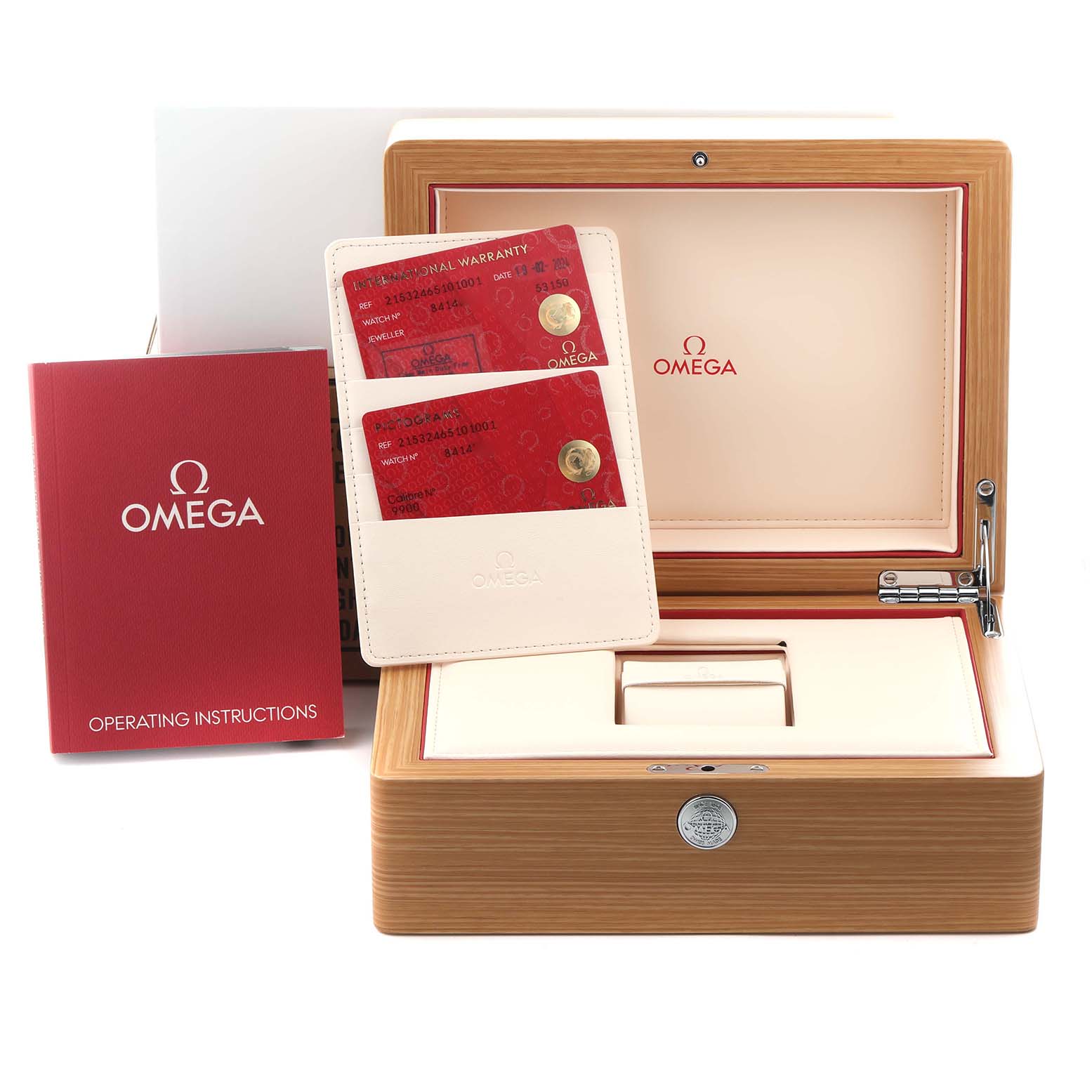 The image shows the box, warranty cards, and manual for an Omega Planet Ocean 215.32.46.51.01.001 Men
s Stainless Steel Black Dial 215.32.46.51.01.001 Men
s Stainless Steel Black Dial watch.