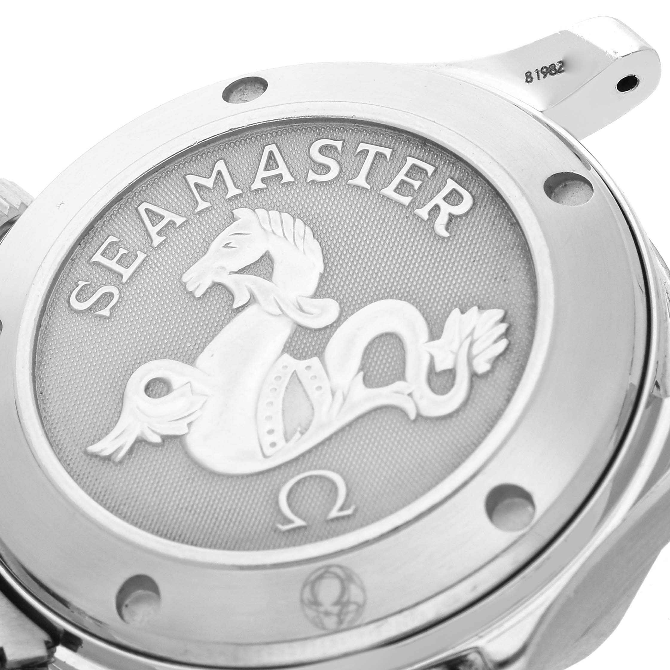 This image shows the back of an Omega Seamaster, highlighting the embossed seahorse emblem and branding details.