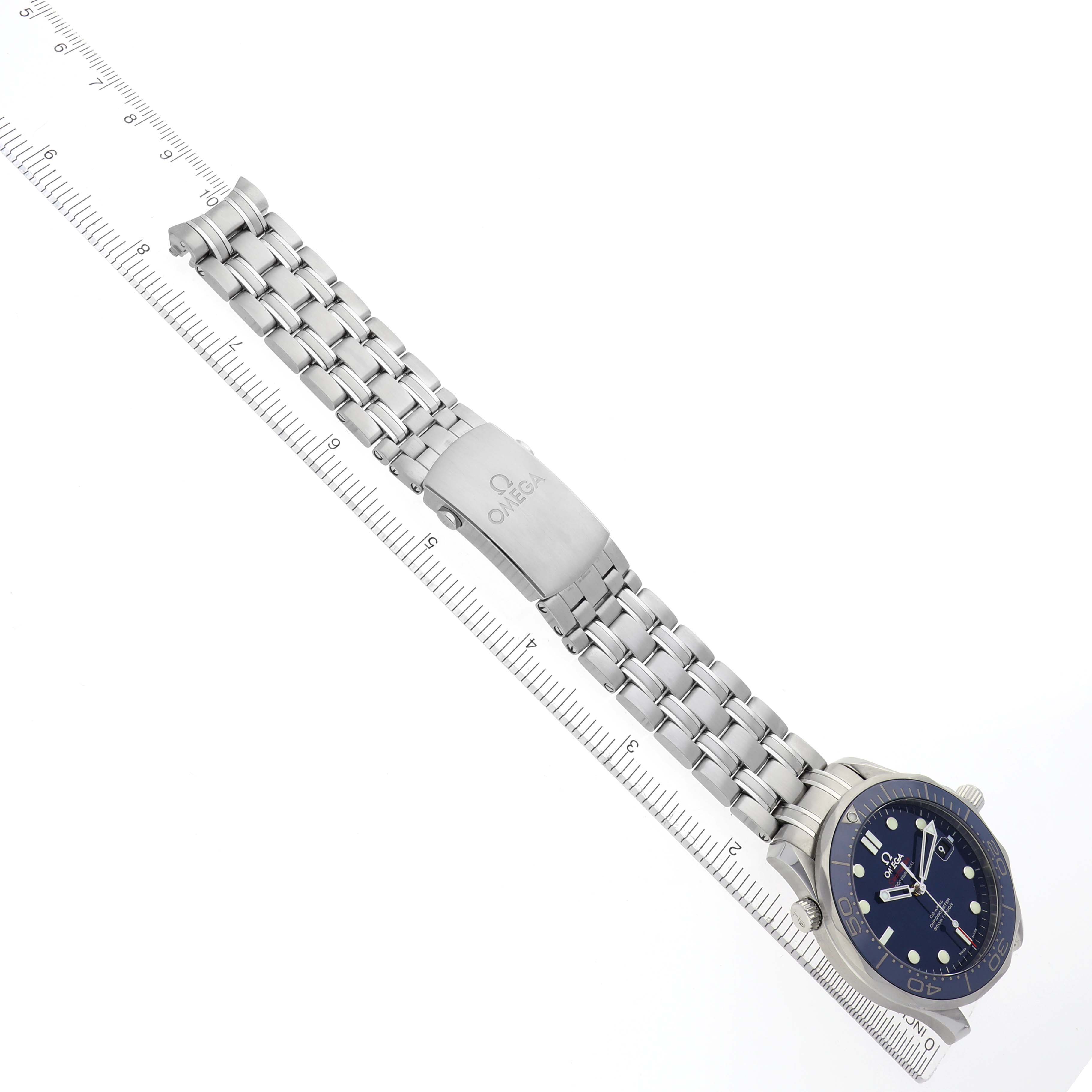 The Omega Seamaster 212.30.41.20.03.001 Men's Stainless Steel Blue Dial 212.30.41.20.03.001 Men's Stainless Steel Blue Dial watch is shown diagonally, displaying the face and stainless steel bracelet with a measuring scale beneath.