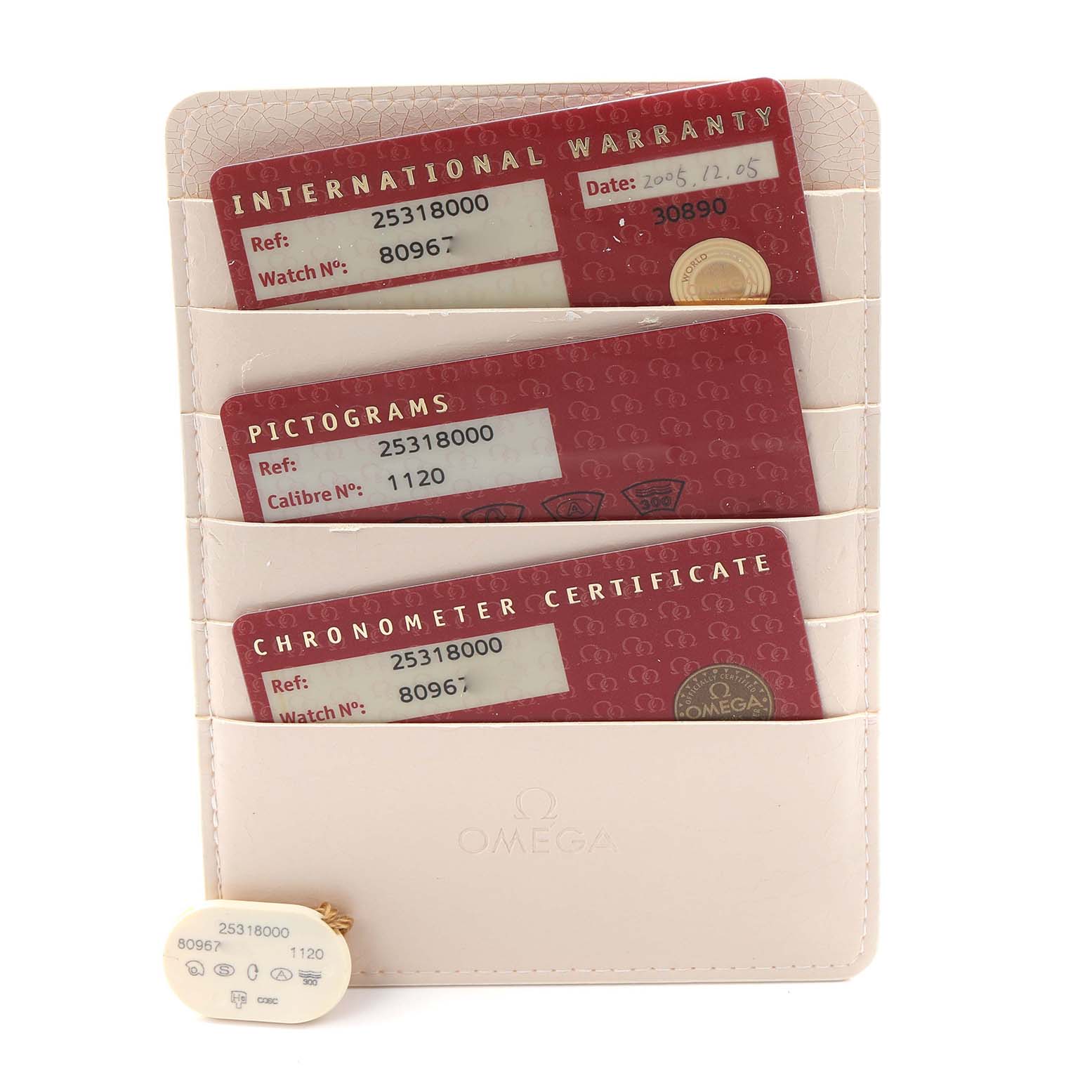 The image shows Omega Seamaster 2531.80.00 Men's Stainless Steel Blue Dial 2531.80.00 Men's Stainless Steel Blue Dial accessories including warranty, pictogram, and chronometer cards in a holder, viewed from the front.