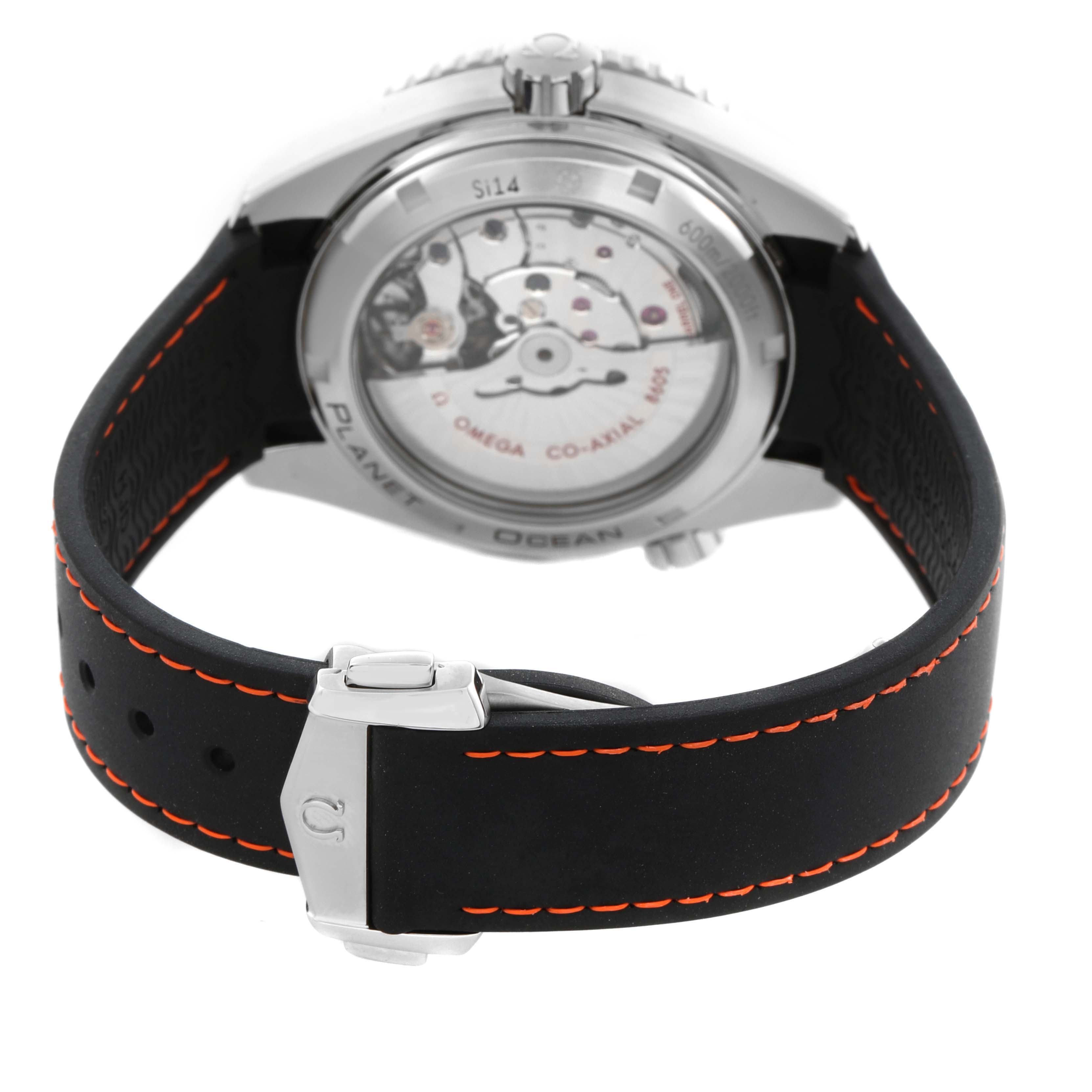 The Omega Planet Ocean 232.32.44.22.01.001 Men
s Stainless Steel Black Dial 232.32.44.22.01.001 Men
s Stainless Steel Black Dial watch is shown from the back, highlighting the transparent case back and part of the strap.