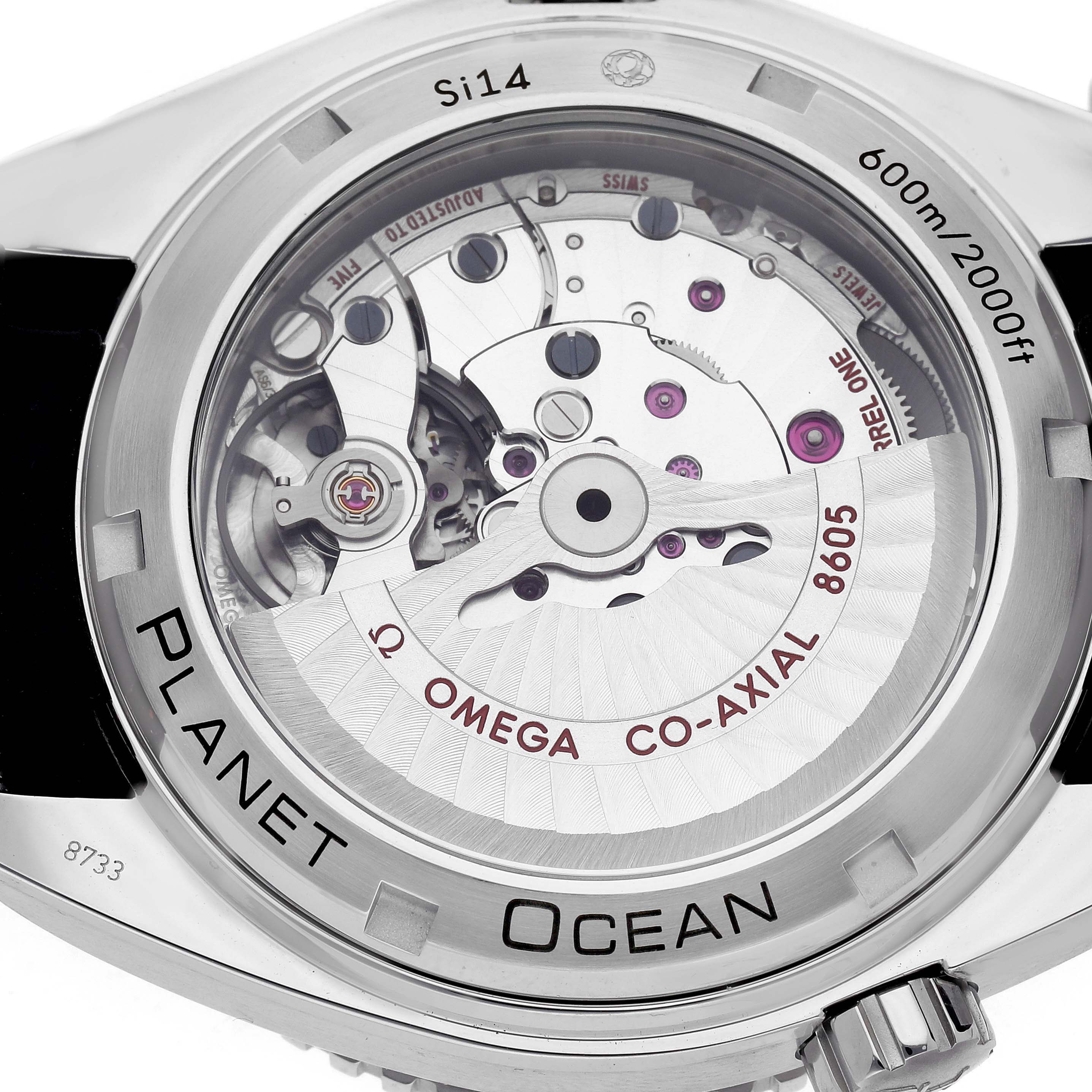 The image shows the case back of the Omega Planet Ocean 232.32.44.22.01.001 Men
s Stainless Steel Black Dial 232.32.44.22.01.001 Men
s Stainless Steel Black Dial, highlighting its Co-Axial movement and water resistance markings.