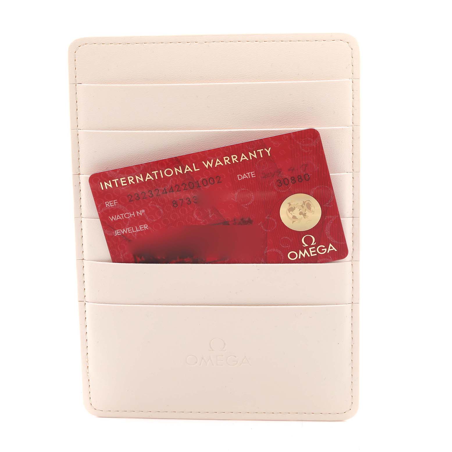 The image shows an Omega Planet Ocean 232.32.44.22.01.001 Men
s Stainless Steel Black Dial 232.32.44.22.01.001 Men
s Stainless Steel Black Dial international warranty card in a cream card holder, viewed from the front.